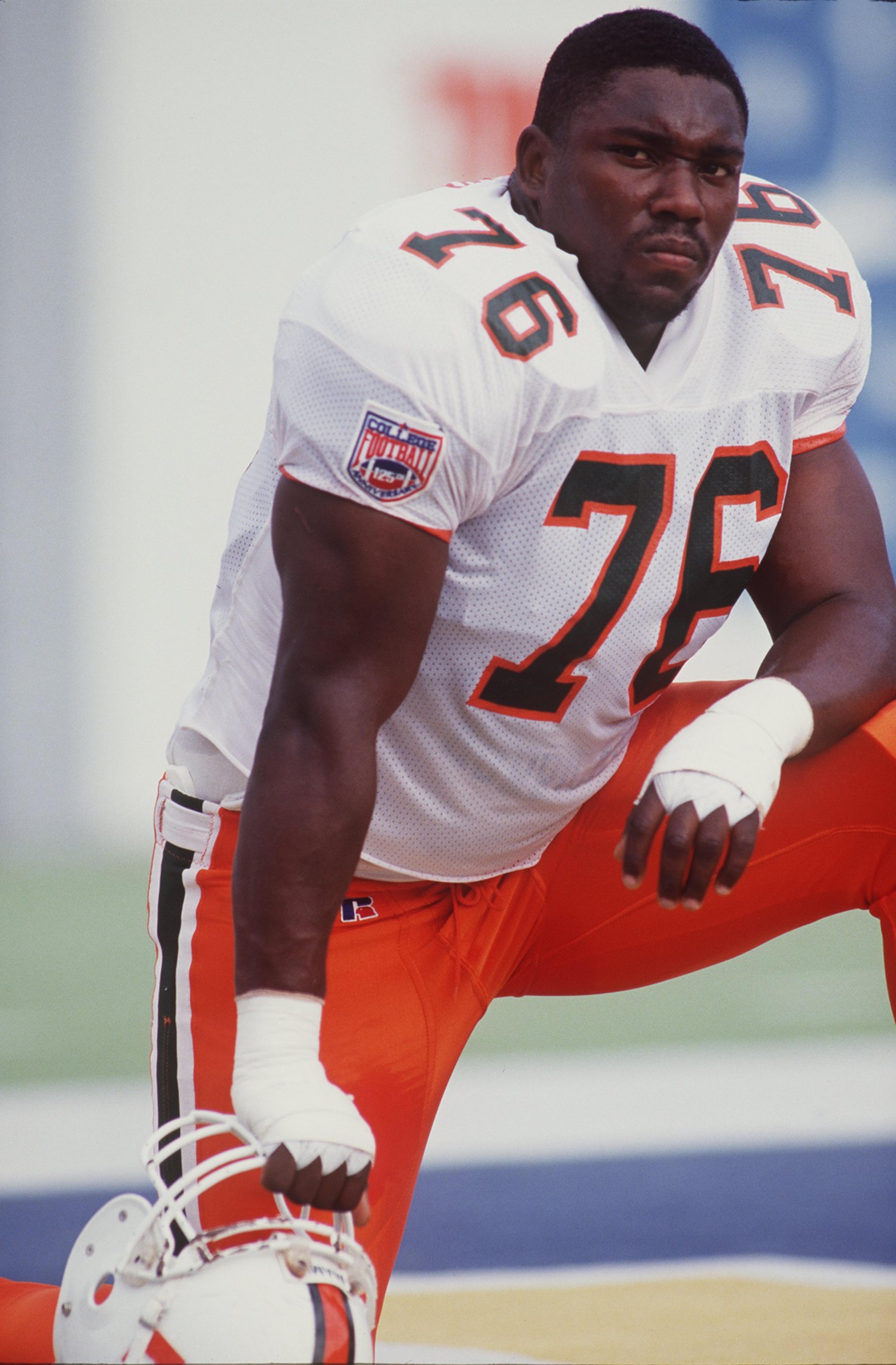 22 OCT 1994: DEFENSIVE TACKLE WARREN SAPP OF THE MIAMI HURRICANES ON THE SIDELINES DURING THE 38-6 WIN OVER WEST VIRGINIA AT MOUNTAINEER FIELD IN MORGANSTOWN, WEST VIRGINIA. Mandatory Credit: Jed Jacobson/ALLSPORT 22 OCT 1994: DEFENSIVE TACKLE WARREN SAPP OF THE MIAMI HURRICANES ON THE SIDELINES DURING THE 38-6 WIN OVER WEST VIRGINIA AT MOUNTAINEER FIELD IN MORGANSTOWN, WEST VIRGINIA. Mandatory Credit: Jed Jacobson/ALLSPORT