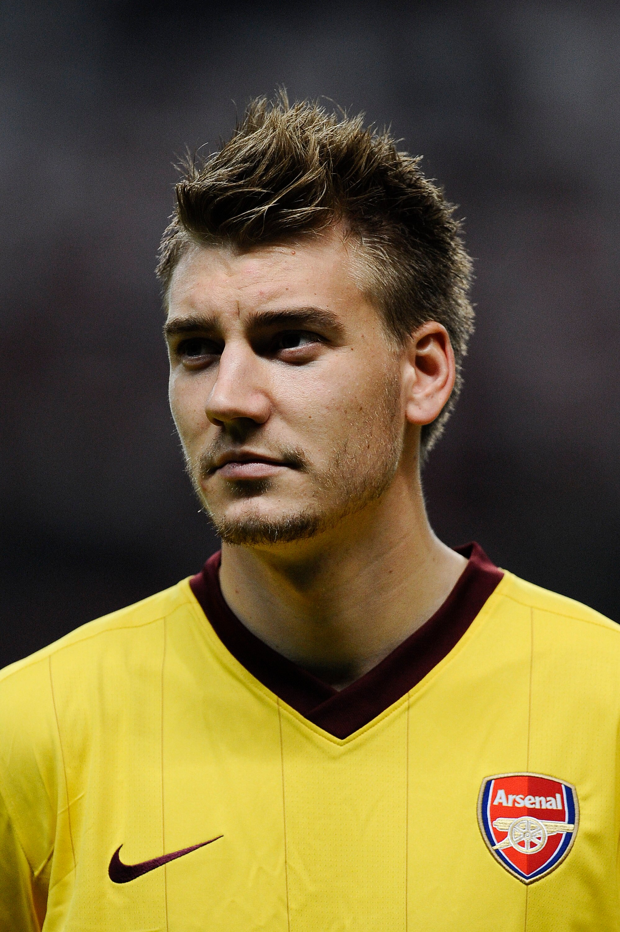 BRAGA, PORTUGAL - NOVEMBER 23:  Nicklas Bendtner of Arsenal looks on during the UEFA Champions League Group H match between SC Braga and Arsenal at Estadio Municipal de Braga on November 23, 2010 in Braga, Portugal. SC Braga won the match 2-0.  (Photo by