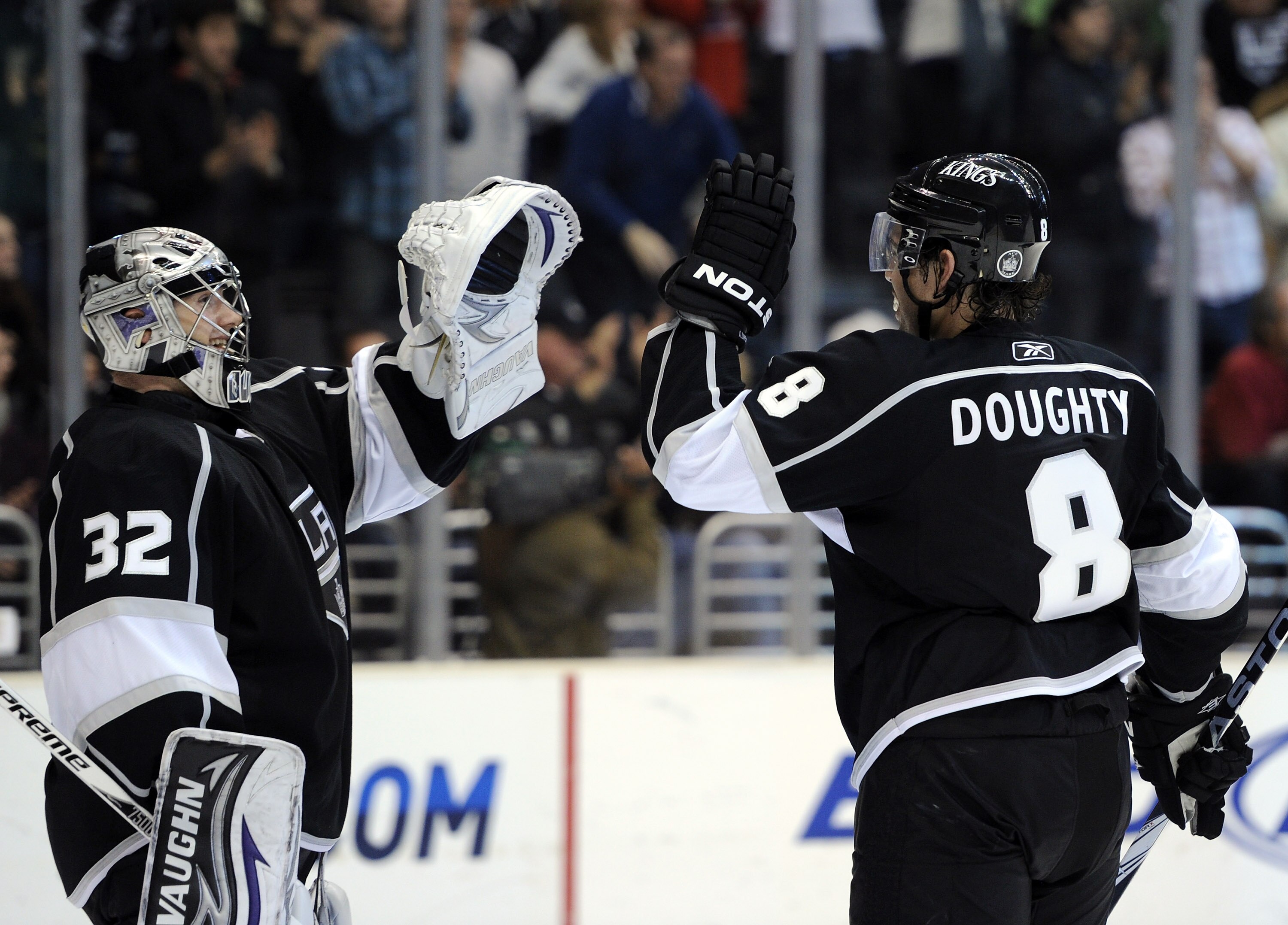 LOS ANGELES, CA - NOVEMBER 11:  Jonathan Quick #32 and Drew Doughty #8 of the Los Angeles Kings celebrate a 3-1 win over the Dallas Stars at the Staples Center on November 11, 2010 in Los Angeles, California.  (Photo by Harry How/Getty Images)