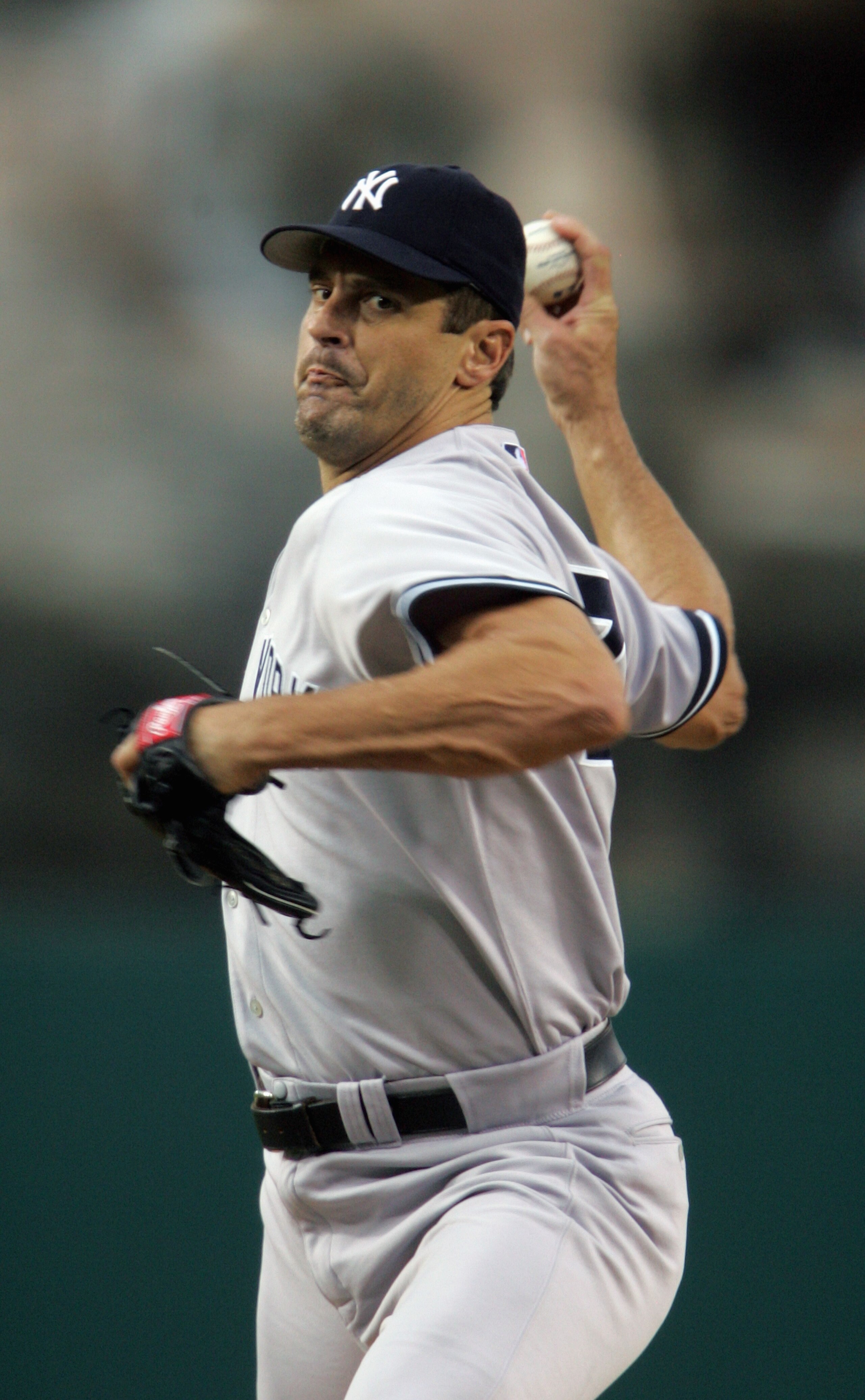 ANAHEIM, CA - JULY 23:  Kevin Brown #27 of the New York Yankees pitches during the game with the Los Angeles Angels of Anaheim at Angel Stadium on July 23, 2005 in Anaheim, California. The Angels defeated the Yankees 8-6. (Photo by Jeff Gross/Getty Images