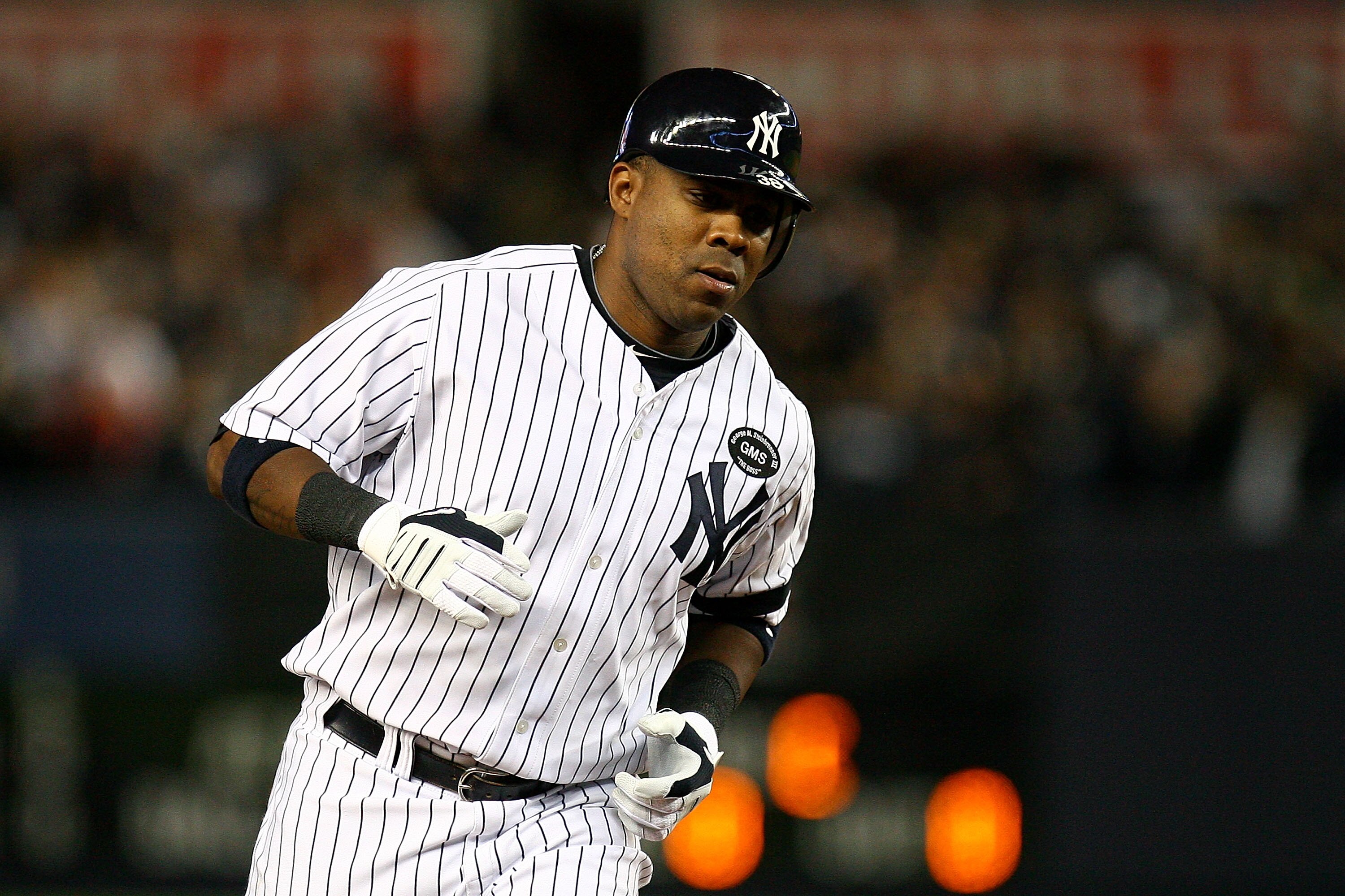 NEW YORK - OCTOBER 09:  Marcus Thames #38 of the New York Yankees rounds third base as he scores on his 2-run home run in the bottom of the fourth inning against the Minnesota Twins during Game Three of the ALDS part of the 2010 MLB Playoffs at Yankee Sta