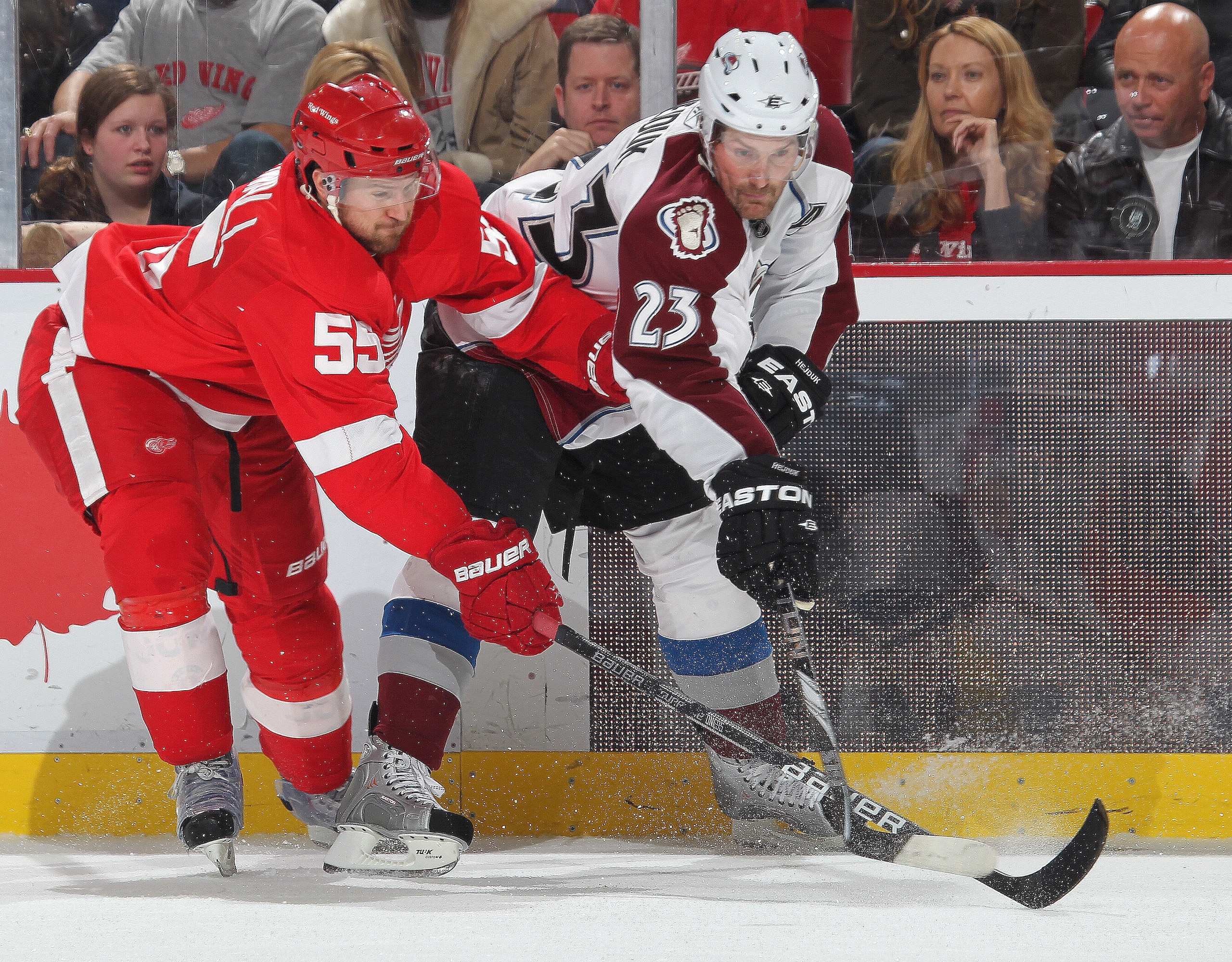 DETROIT,MI - NOVEMBER 13:  Niklas Kronwall #55 of the Detroit Red Wings battles with Milan Hejduk #23 of the Colorado Avalanche in a game on November 13,2010 at the Joe Louis Arena in Detroit, Michigan. The Wings defeated the Avalanche 3-1. (Photo by Clau