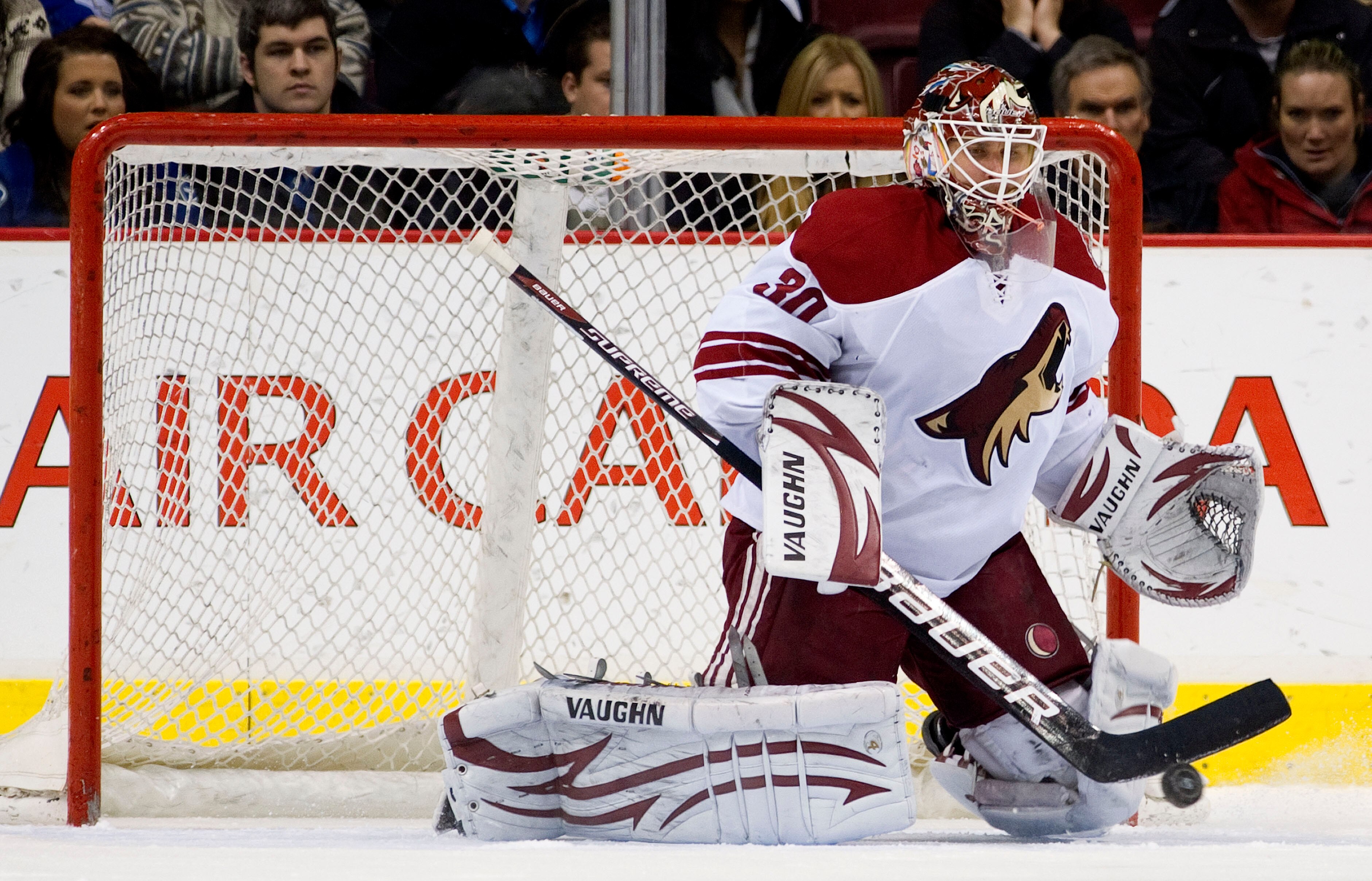 VANCOUVER, CANADA - NOVEMBER 21: Goalie Ilya Bryzgalov #30 of the Phoenix Coyotes makes a pad save against the Vancouver Canucks during the third period in NHL action on November 21, 2010 at Rogers Arena in Vancouver, British Columbia, Canada.  (Photo by