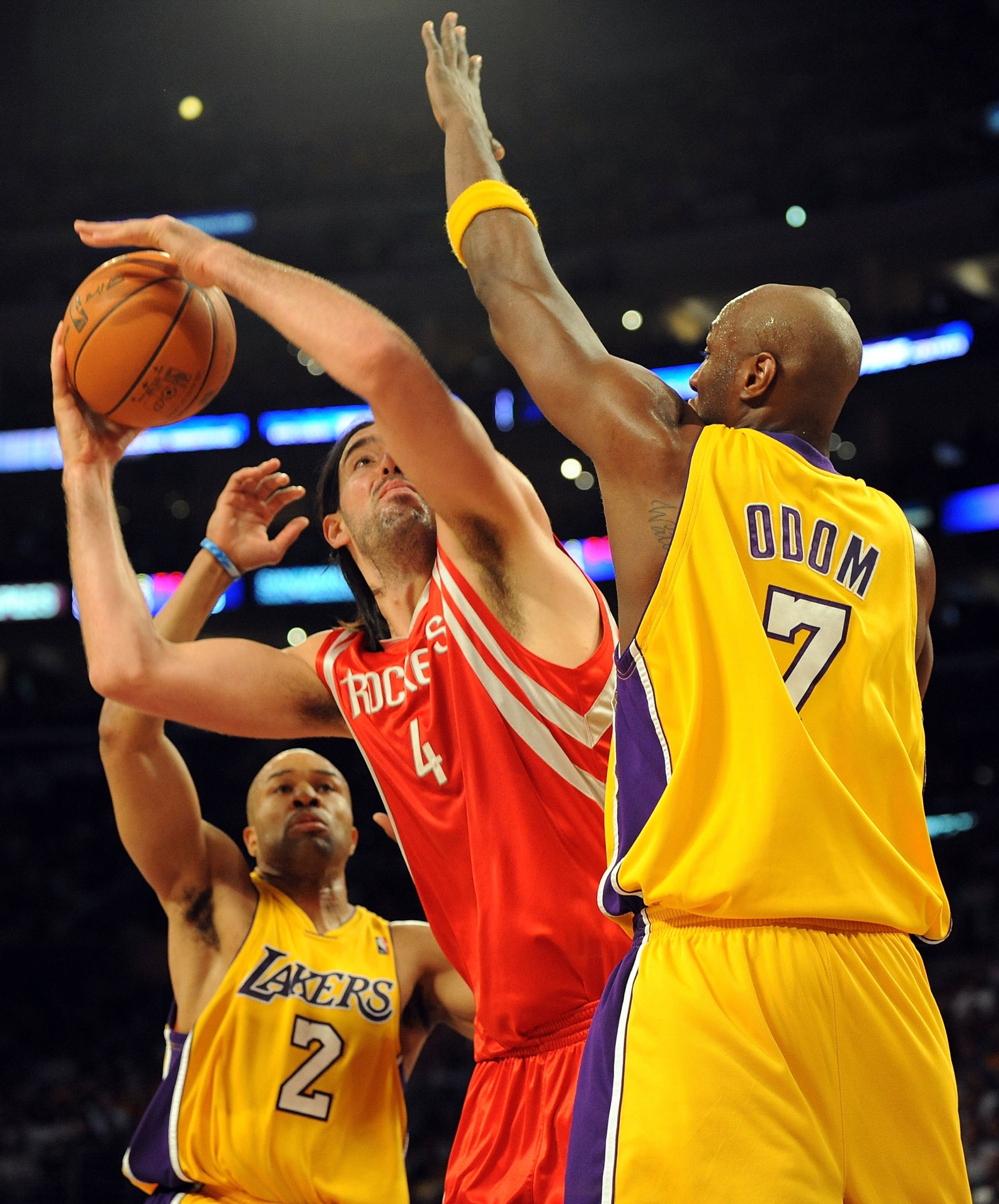 LOS ANGELES, CA - MAY 06:  Luis Scola #4 of the Houston Rockets shoots the ball over Derek Fisher #2 and Lamar Odom #7 of the Los Angeles Lakers in the third quarter of Game Two of the Western Conference Semifinals during the 2009 NBA Playoffs at Staples