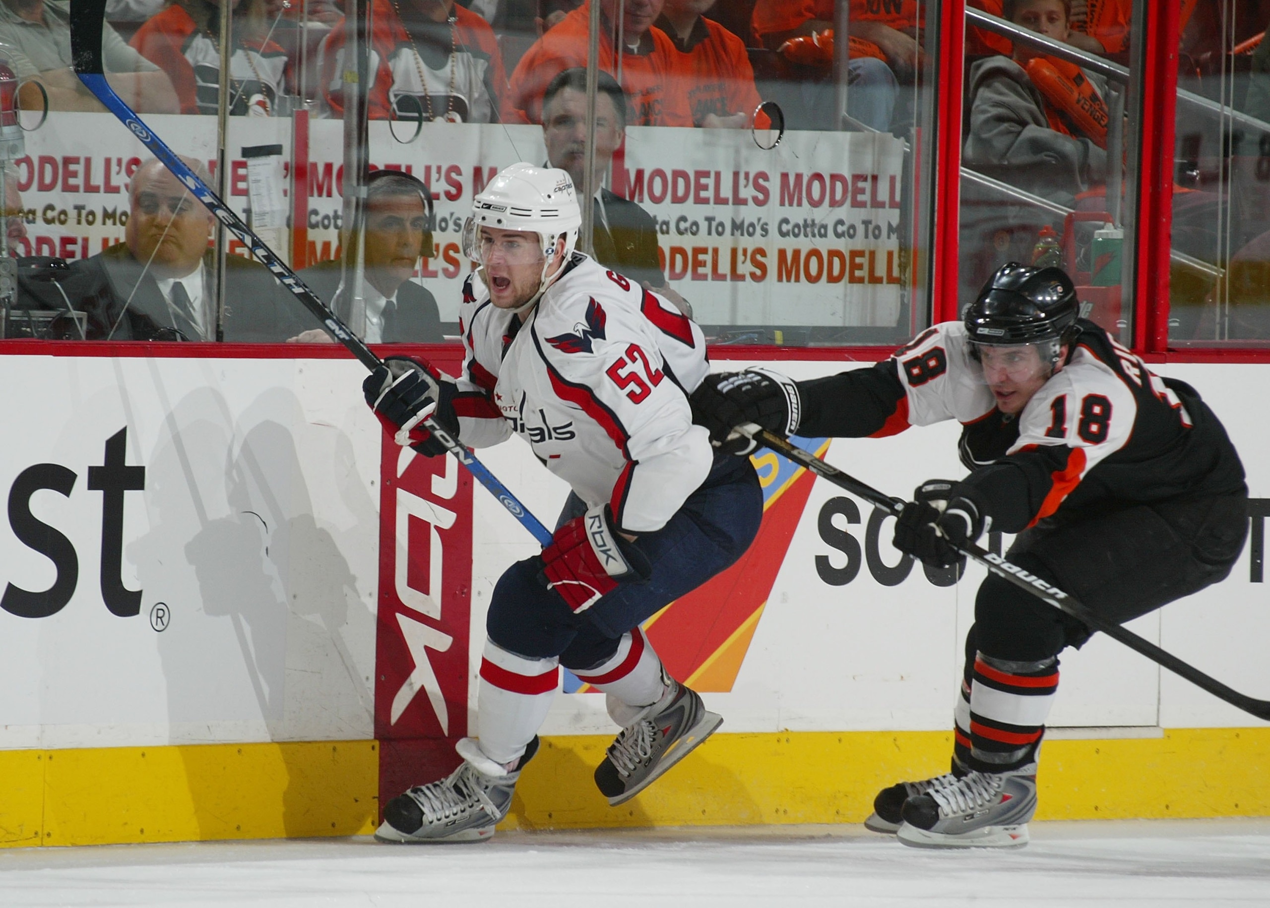 PHILADELPHIA - APRIL 15: Mike Green #52 of the Washington Capitals stays a step ahead of Mike Richard #18 of the Philadelphia Flyers during game three of the Eastern Conference Quarterfinals of the 2008 NHL Stanley Cup Playoffs on April 15, 2008 at the Wa PHILADELPHIA - APRIL 15: Mike Green #52 of the Washington Capitals stays a step ahead of Mike Richard #18 of the Philadelphia Flyers during game three of the Eastern Conference Quarterfinals of the 2008 NHL Stanley Cup Playoffs on April 15, 2008 at the Wa