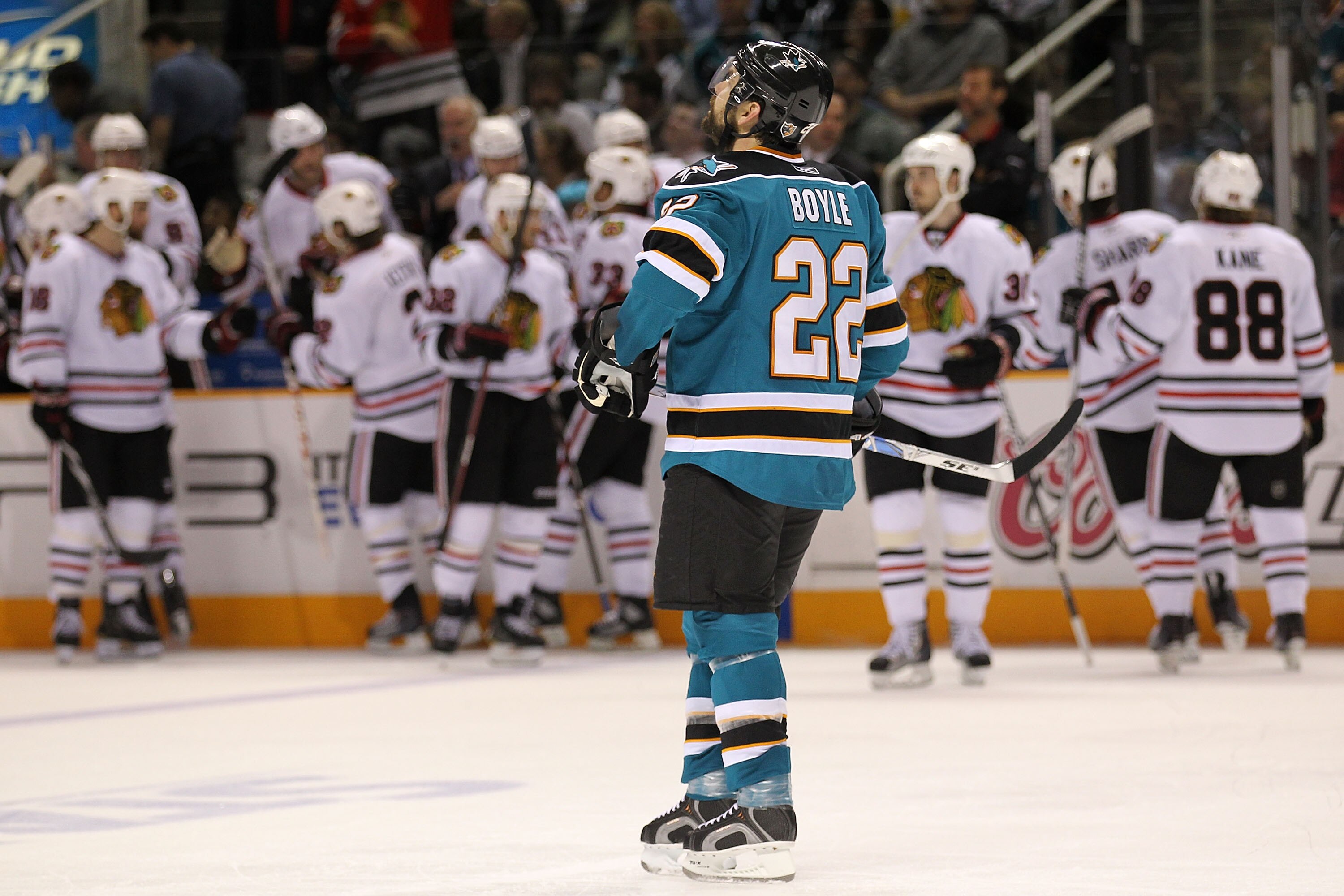 SAN JOSE, CA - MAY 18:  Dan Boyle #22 of the San Jose Sharks reacts after a second period goal was scored by Jonathan Toews #19 of the Chicago Blackhawks in Game Two of the Western Conference Finals during the 2010 NHL Stanley Cup Playoffs at HP Pavilion
