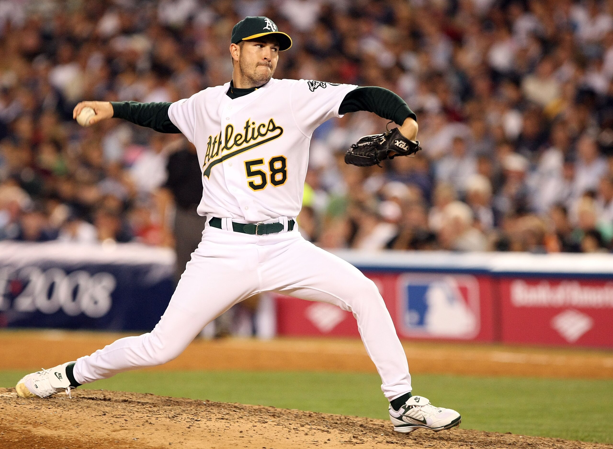 NEW YORK - JULY 15:  American League All-Star Justin Duchscherer #58 of the Oakland A's pitches during the 79th MLB All-Star Game at Yankee Stadium on July 15, 2008 in the Bronx borough of New York City.  (Photo by Nick Laham/Getty Images)
