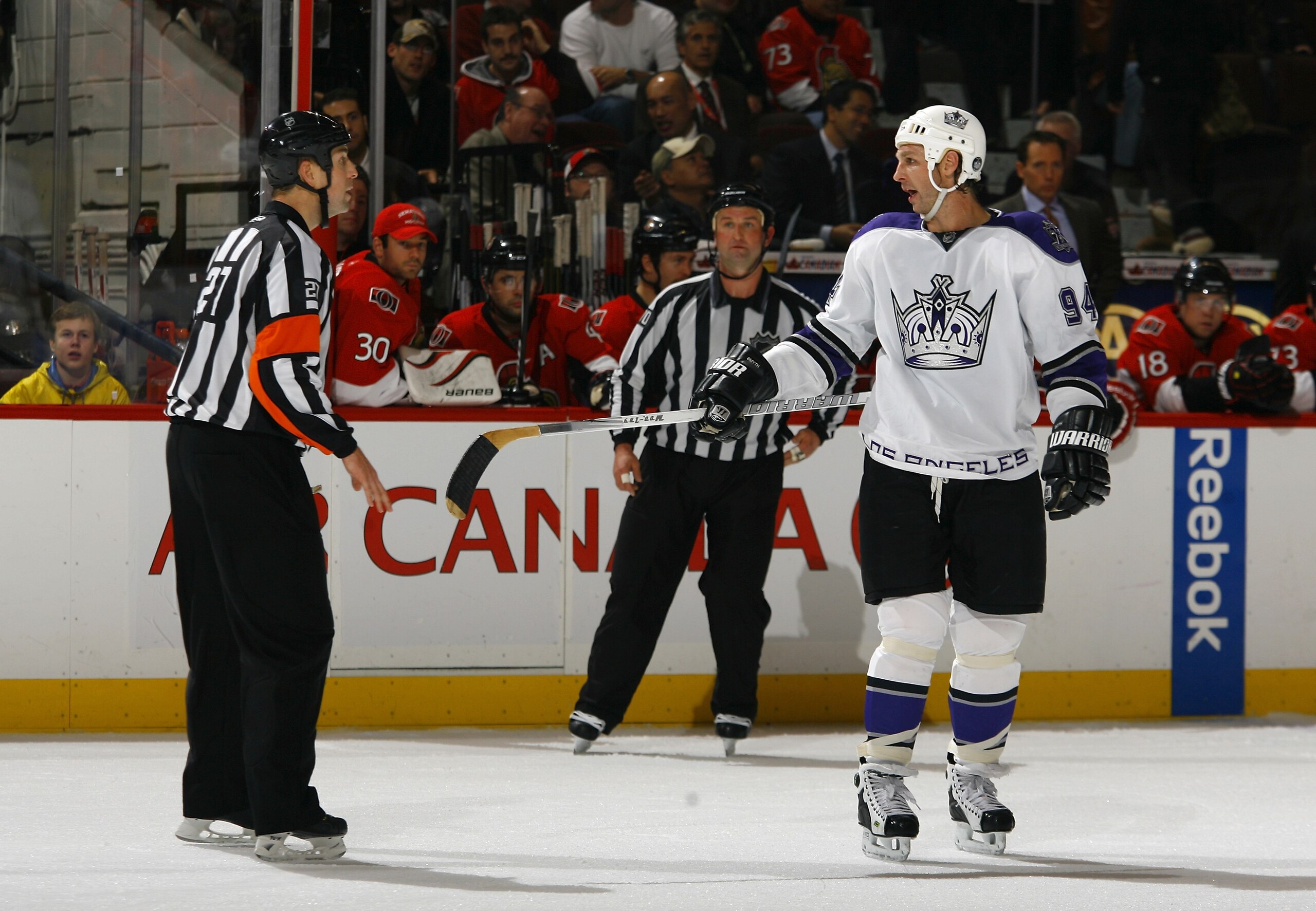 OTTAWA, ON - NOVEMBER 22: Ryan Smyth #94 of the Los Angeles Kings has words with referee Eric Furlatt (27) after having a goal called back for a high-stick in a game against the Ottawa Senators at Scotiabank Place on November 22, 2010 in Ottawa, Ontario, OTTAWA, ON - NOVEMBER 22: Ryan Smyth #94 of the Los Angeles Kings has words with referee Eric Furlatt (27) after having a goal called back for a high-stick in a game against the Ottawa Senators at Scotiabank Place on November 22, 2010 in Ottawa, Ontario,
