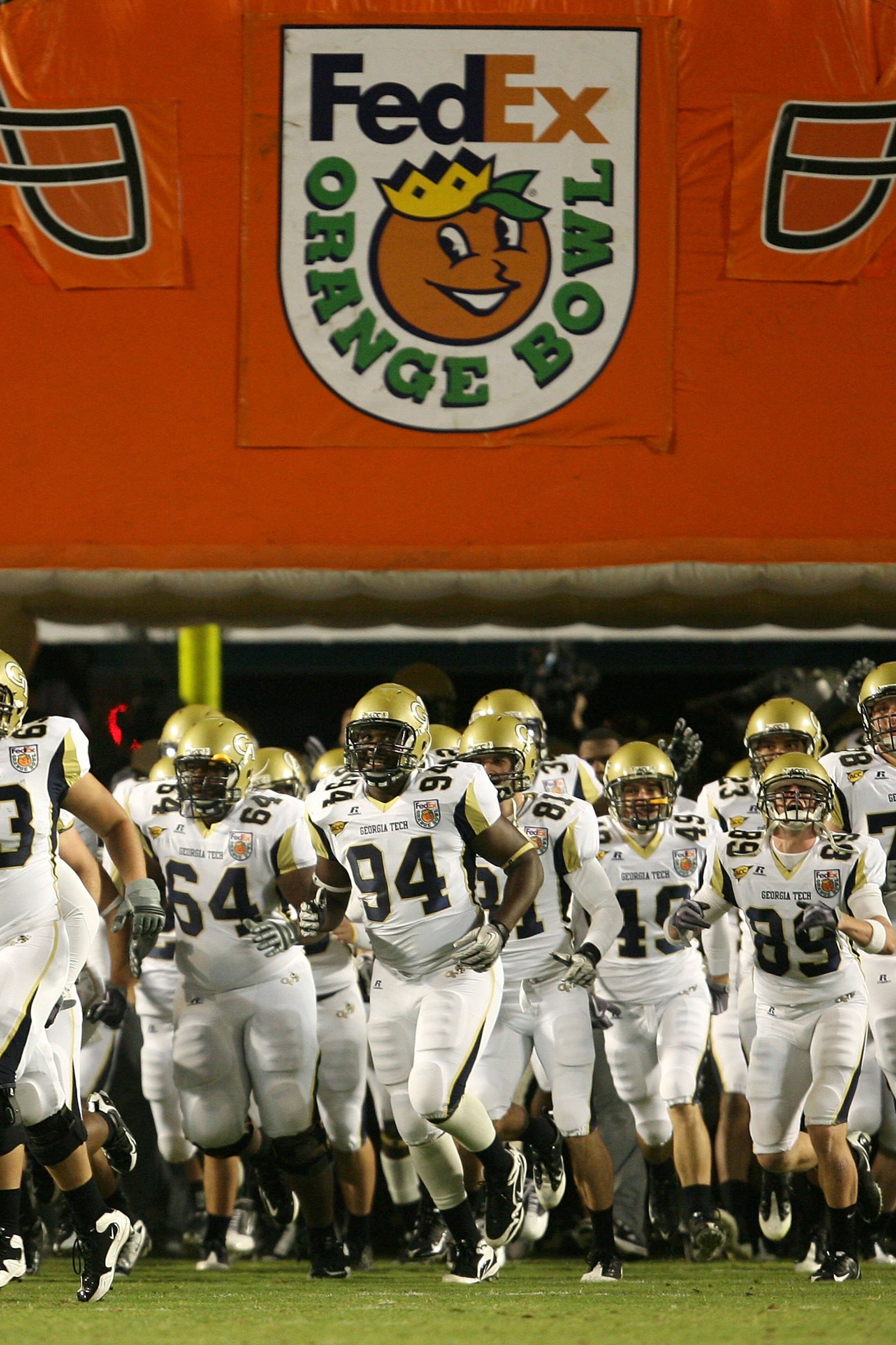 MIAMI GARDENS, FL - JANUARY 05:  The Georgia Tech Yellow Jackets take the field to play against the Iowa Hawkeyes during the FedEx Orange Bowl at Land Shark Stadium on January 5, 2010 in Miami Gardens, Florida.  (Photo by Doug Benc/Getty Images)