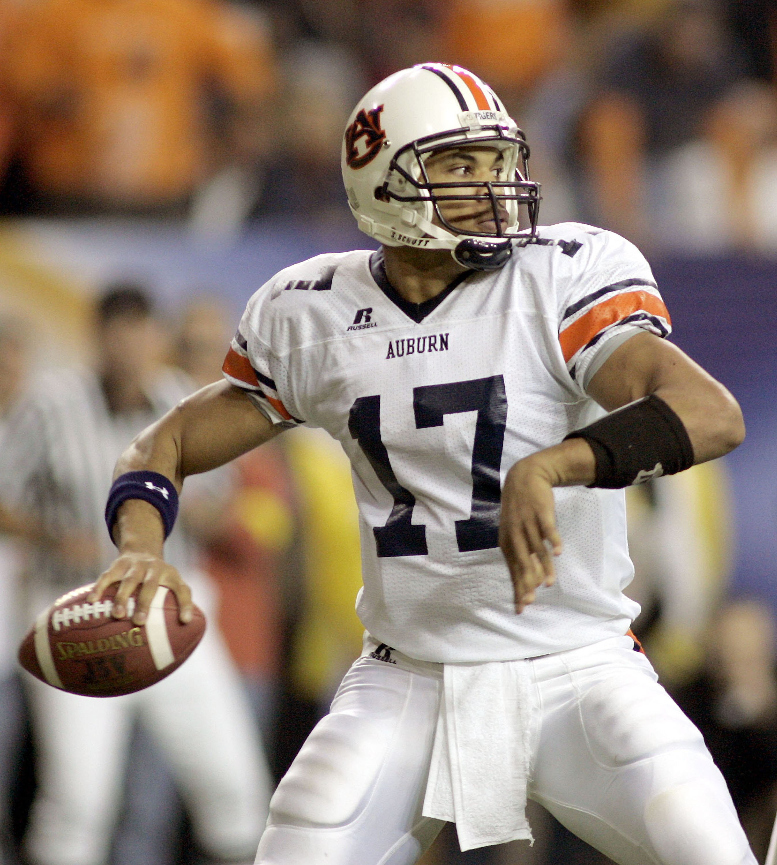 ATLANTA - DECEMBER 4:  Quarterback Jason Campbell #17 of the Auburn Tigers looks to pass against the Tennessee Volunteers during the 2004 SEC Championship Game at the Georgia Dome on December 4, 2004 in Atlanta, Georgia.  Auburn defeated Tennessee 38-28.