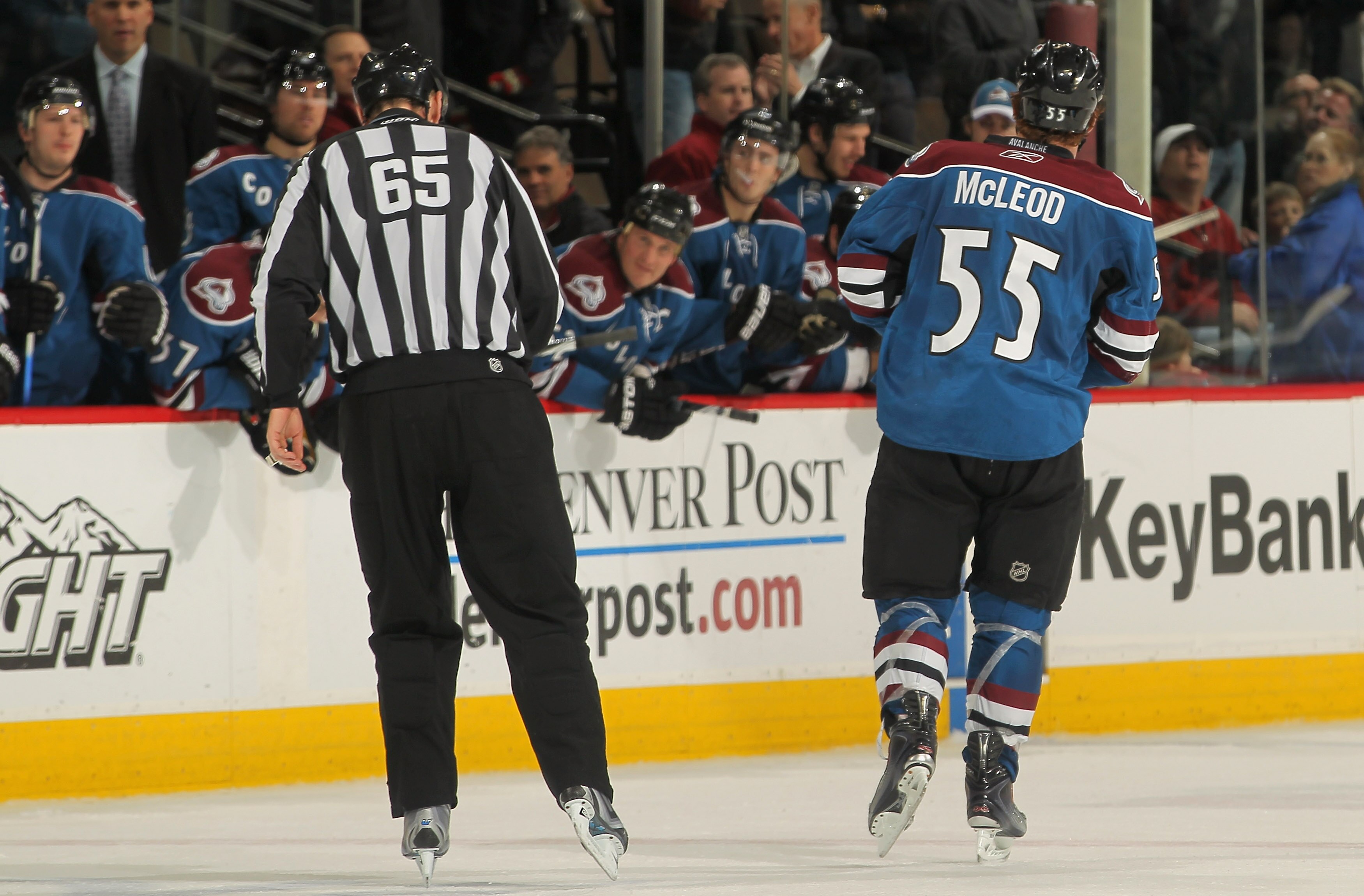 DENVER - NOVEMBER 19:  Cody McLeod #55 of the Colorado Avalanche is sent off the ice as he and Sean Avery #16 of the New York Rangers recieving misconduct penalties late in the third period at the Pepsi Center on November 19, 2010 in Denver, Colorado. The