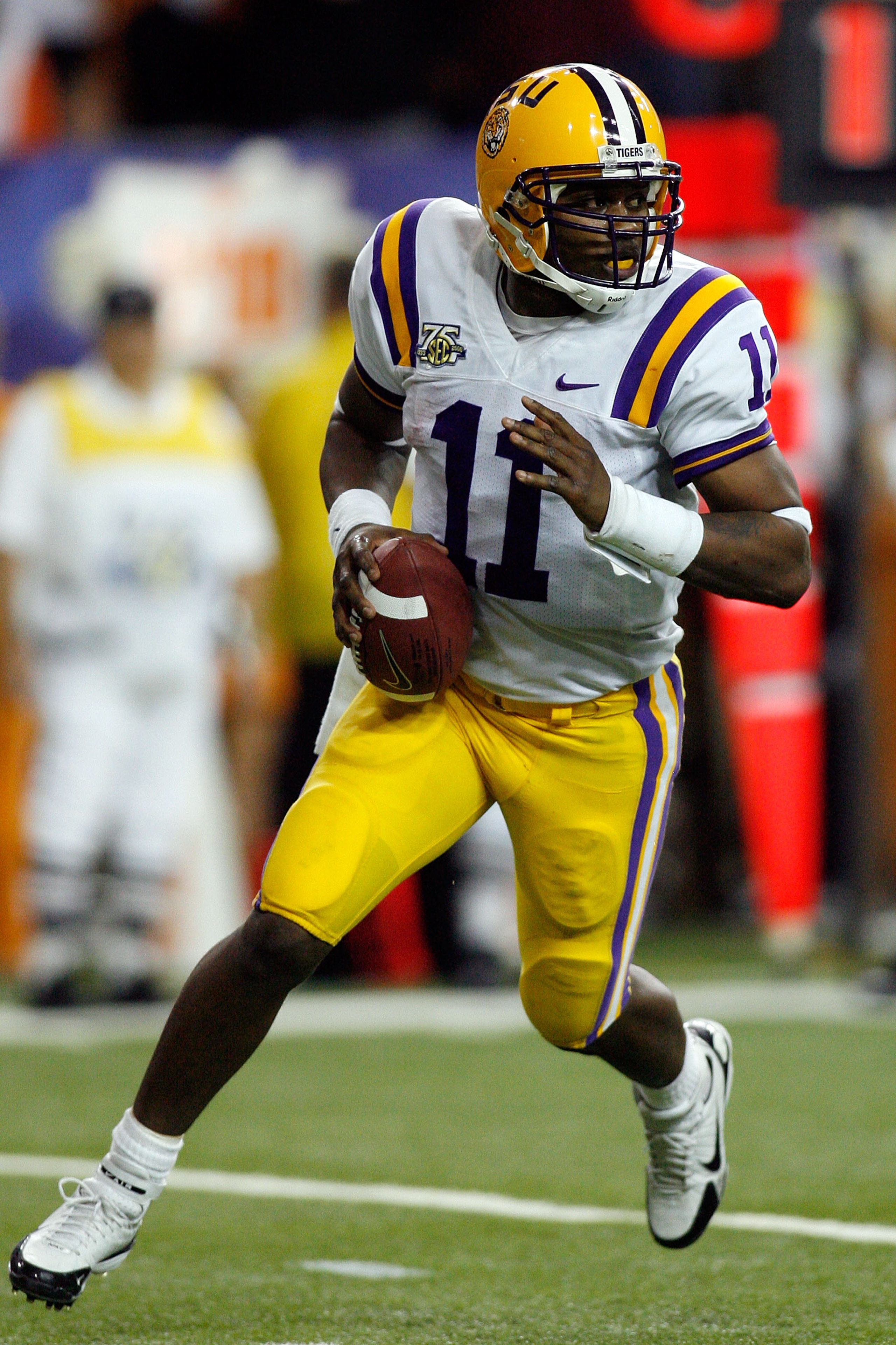 ATLANTA - DECEMBER 01:  Quarterback Ryan Perrilloux #11 of the Louisiana State University Tigers scrambles against the University of Tennessee Volunteers in the SEC Championship game on December 1, 2007 at the Georgia Dome in Atlanta, Georgia.  (Photo by