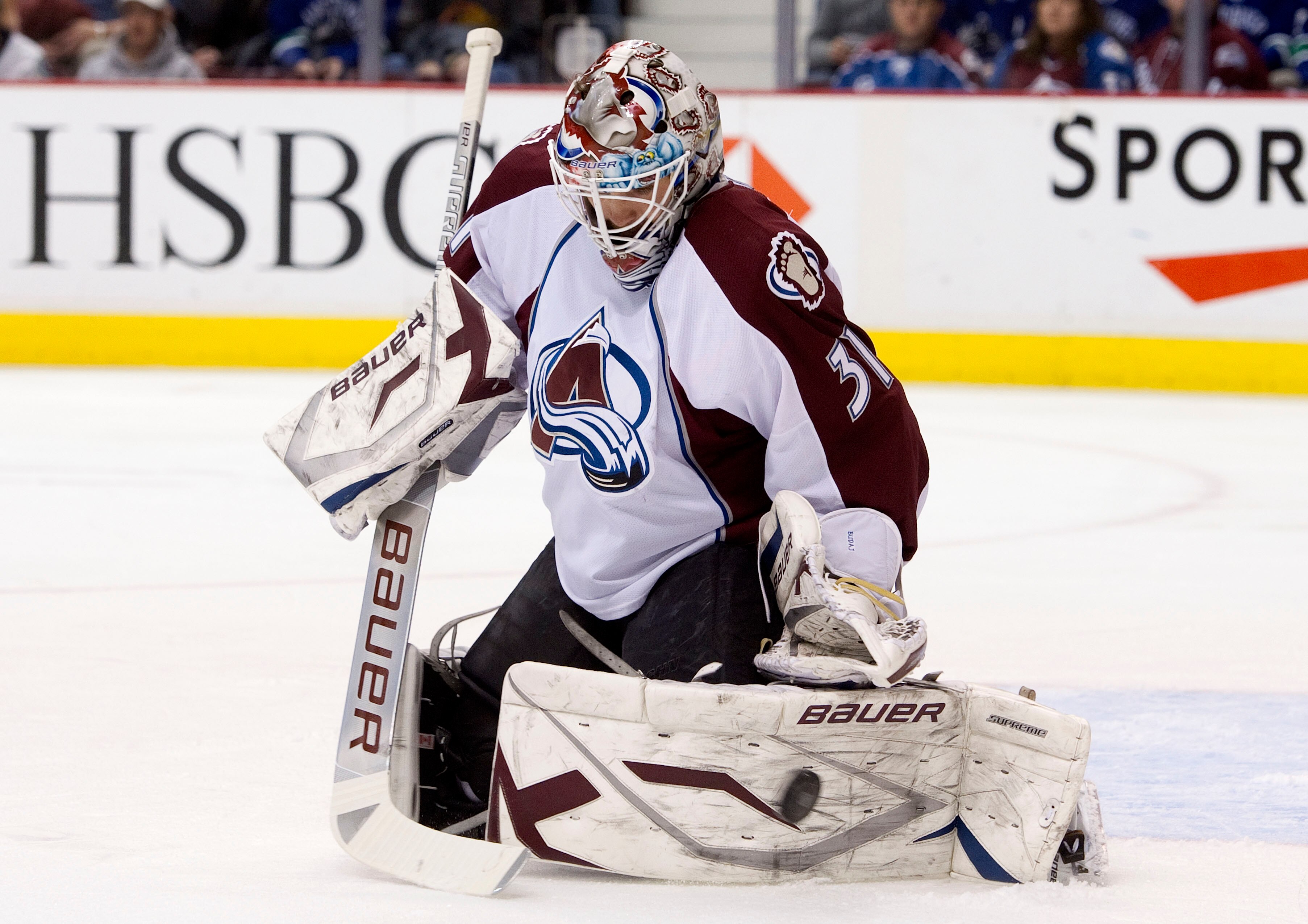 VANCOUVER, CANADA - NOVEMBER 24: Goalie Peter Budaj #31 of the Colorado Avalanche makes a pad save against the Vancouver Canucks during the second period in NHL action on November 24, 2010 at Rogers Arena in Vancouver, British Columbia, Canada.  (Photo by