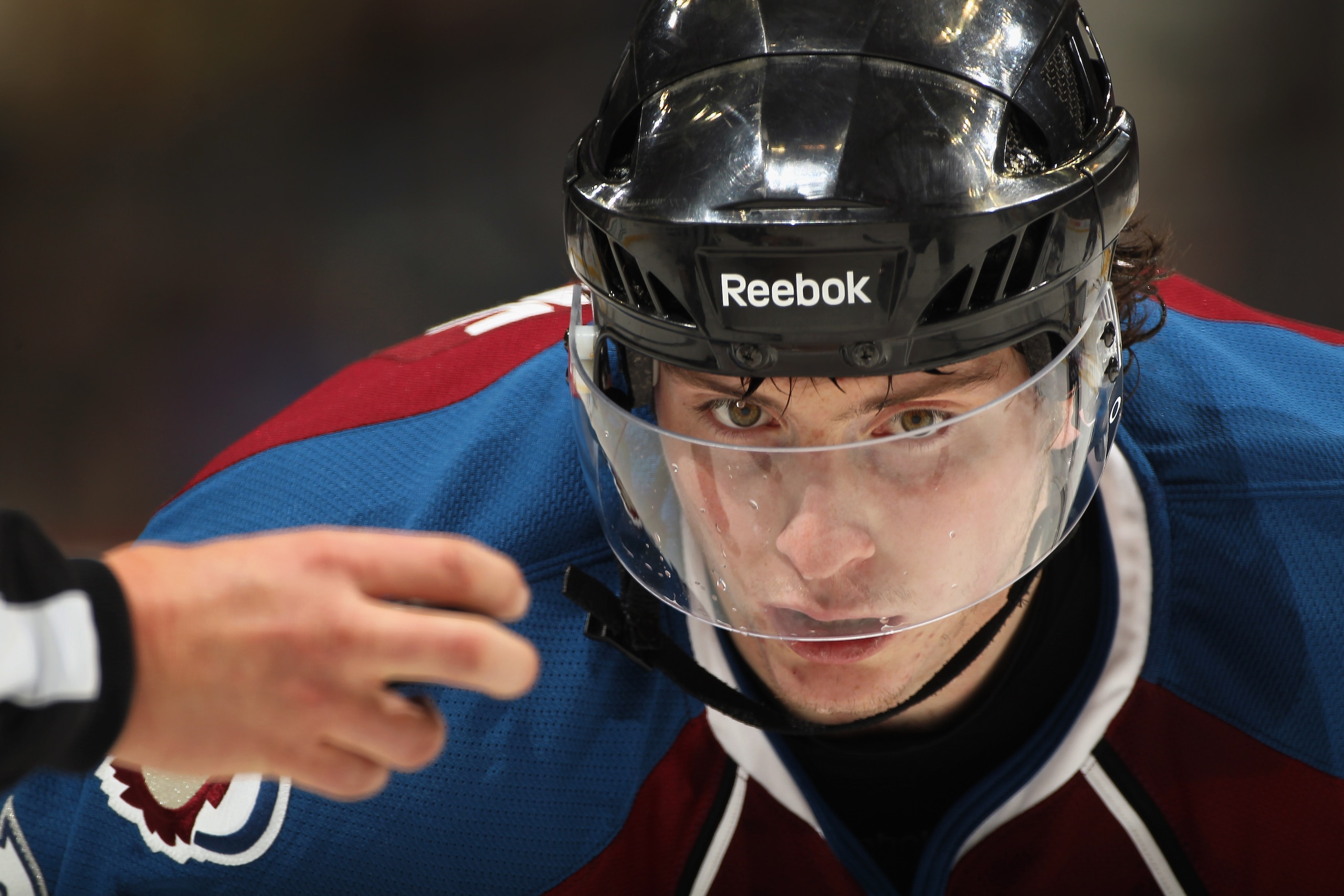 DENVER - NOVEMBER 17:  Matt Duchene #9 of the Colorado Avalanche prepares for a face off against the San Jose Sharks at the Pepsi Center on November 17, 2010 in Denver, Colorado.  (Photo by Doug Pensinger/Getty Images)