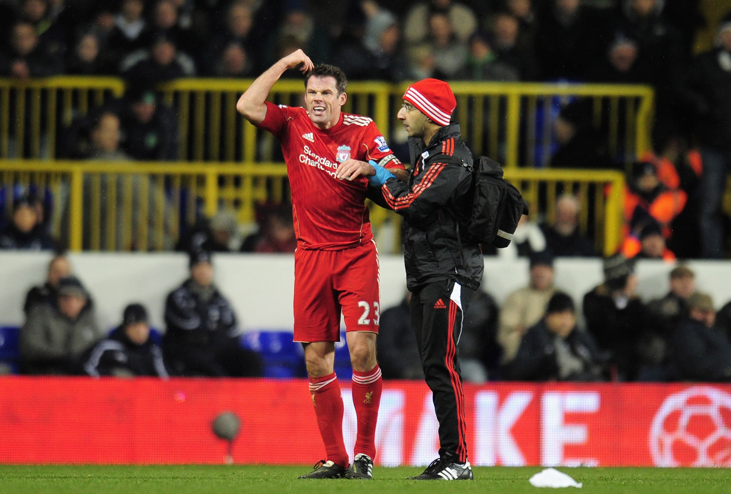 LONDON, ENGLAND - NOVEMBER 28:  Jamie Carragher of Liverpool reacts as he is taken off injured during the Barclays Premier League match between Tottenham Hotspur and Liverpool at White Hart Lane on November 28, 2010 in London, England.  (Photo by Shaun Bo