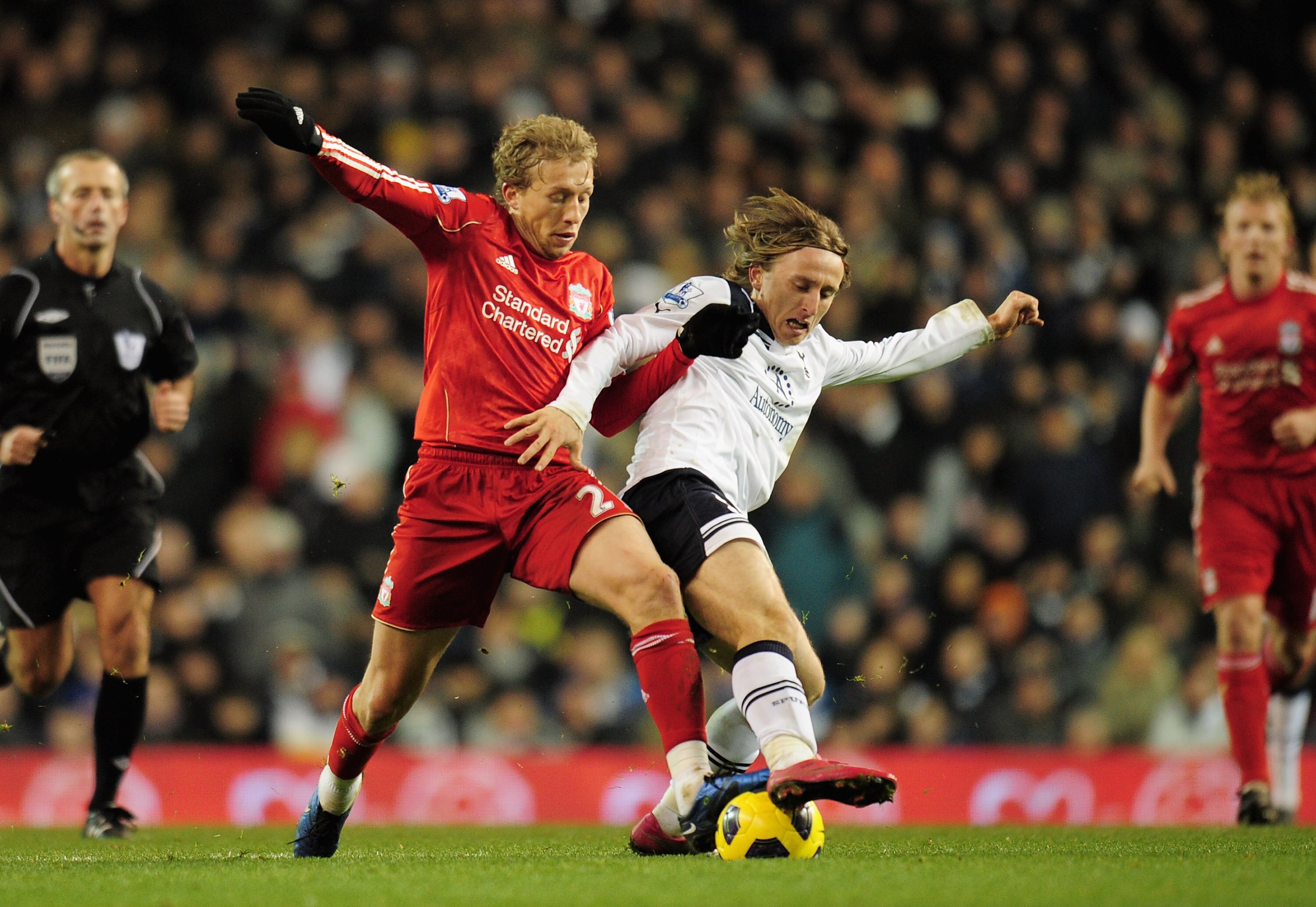 LONDON, ENGLAND - NOVEMBER 28:  Leiva Lucas of Liverpool and Luka Modric of Tottenham Hotspur battle for the ball during the Barclays Premier League match between Tottenham Hotspur and Liverpool at White Hart Lane on November 28, 2010 in London, England.