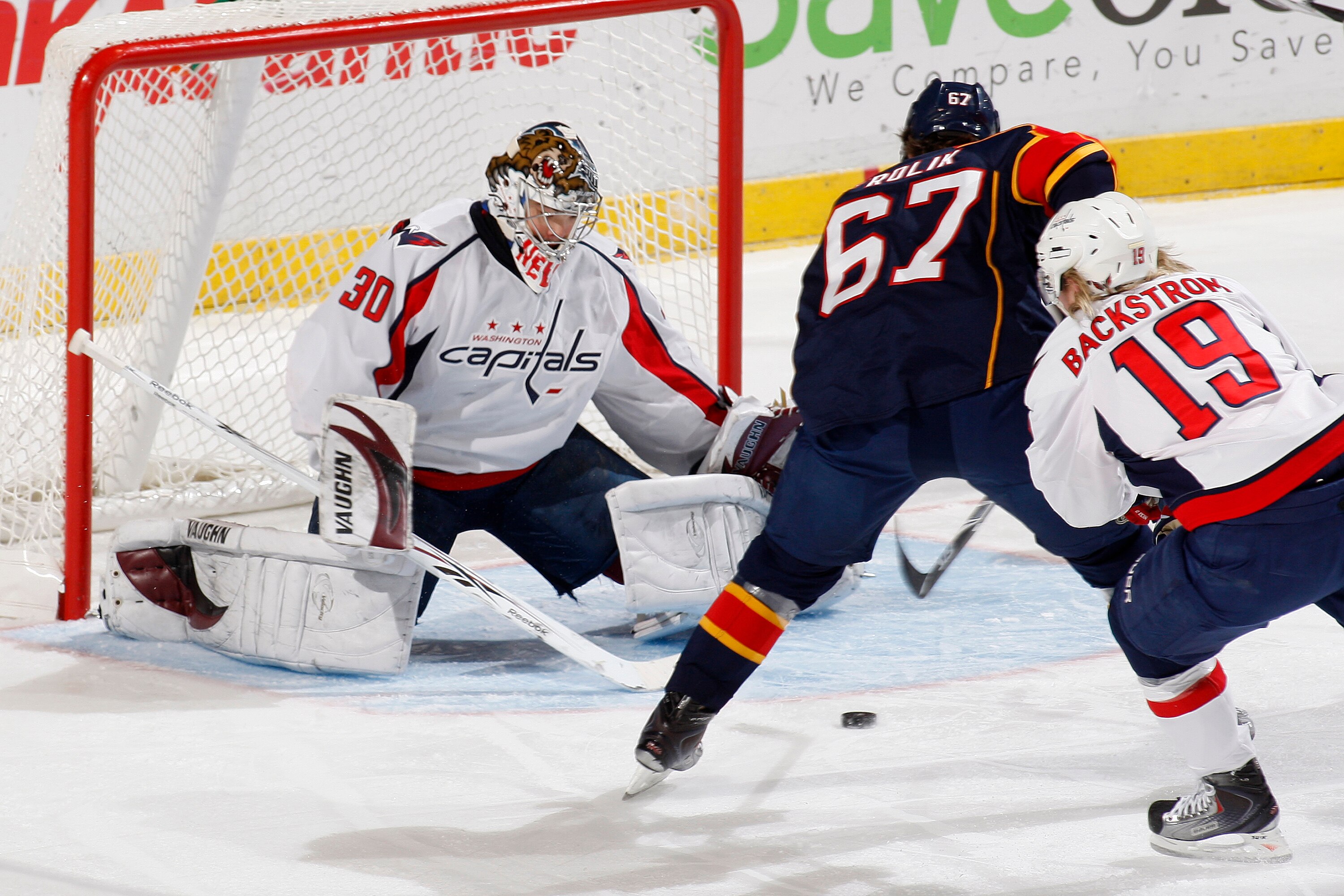 SUNRISE, FL - JANUARY 13: Michael Frolik #67 of the Florida Panthers scores a goal past Michal Neuvirth #30 of the Washington Capitals in the first period on January 13, 2010 at the BankAtlantic Center in Sunrise, Florida. (Photo by Joel Auerbach/Getty Im