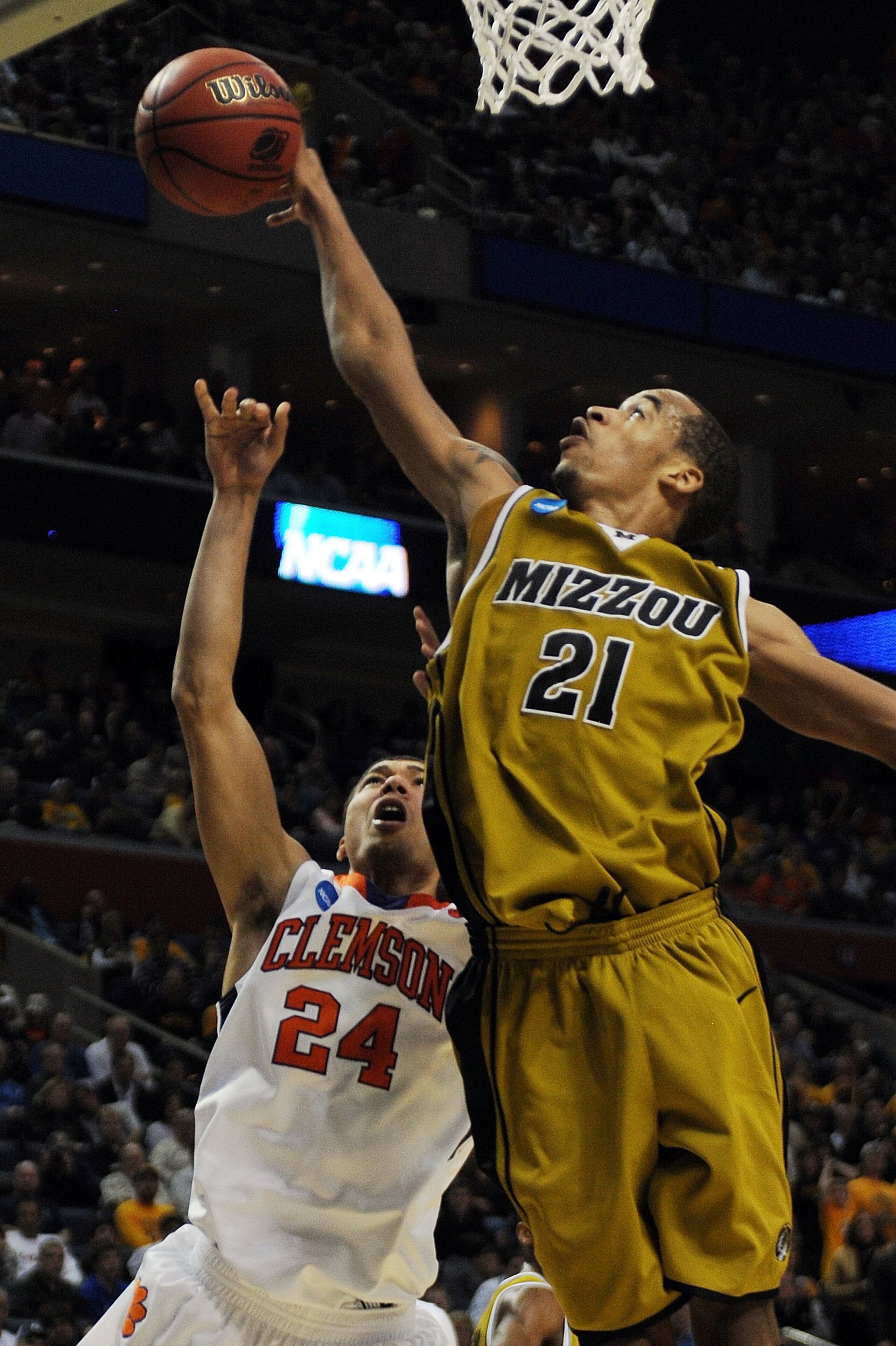 BUFFALO, NY - MARCH 19:  Milton Jennings #24 of the Clemson Tigers goes to the hoop against Laurence Bowers #21 of the Missouri Tigers during the first round of the 2010 NCAA men's basketball tournament at HSBC Arena on March 19, 2010 in Buffalo, New York