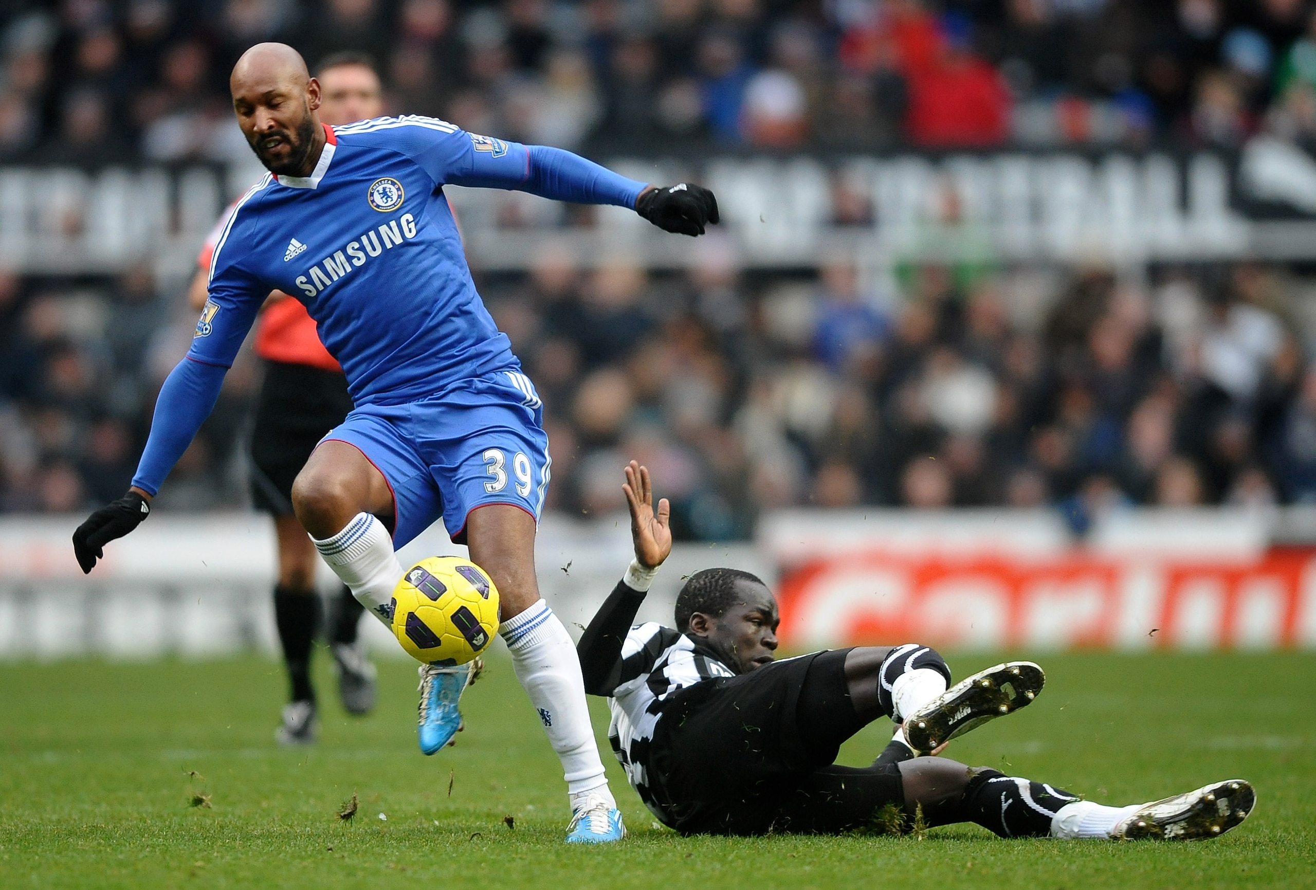 NEWCASTLE UPON TYNE, ENGLAND - NOVEMBER 28: Cheik Tiote of Newcastle United tangles with Nicolas Anelka of Chelsea during the Barclays Premier League match between Newcastle United and Chelsea at St James' Park on November 28, 2010 in Newcastle, England. NEWCASTLE UPON TYNE, ENGLAND - NOVEMBER 28: Cheik Tiote of Newcastle United tangles with Nicolas Anelka of Chelsea during the Barclays Premier League match between Newcastle United and Chelsea at St James' Park on November 28, 2010 in Newcastle, England.