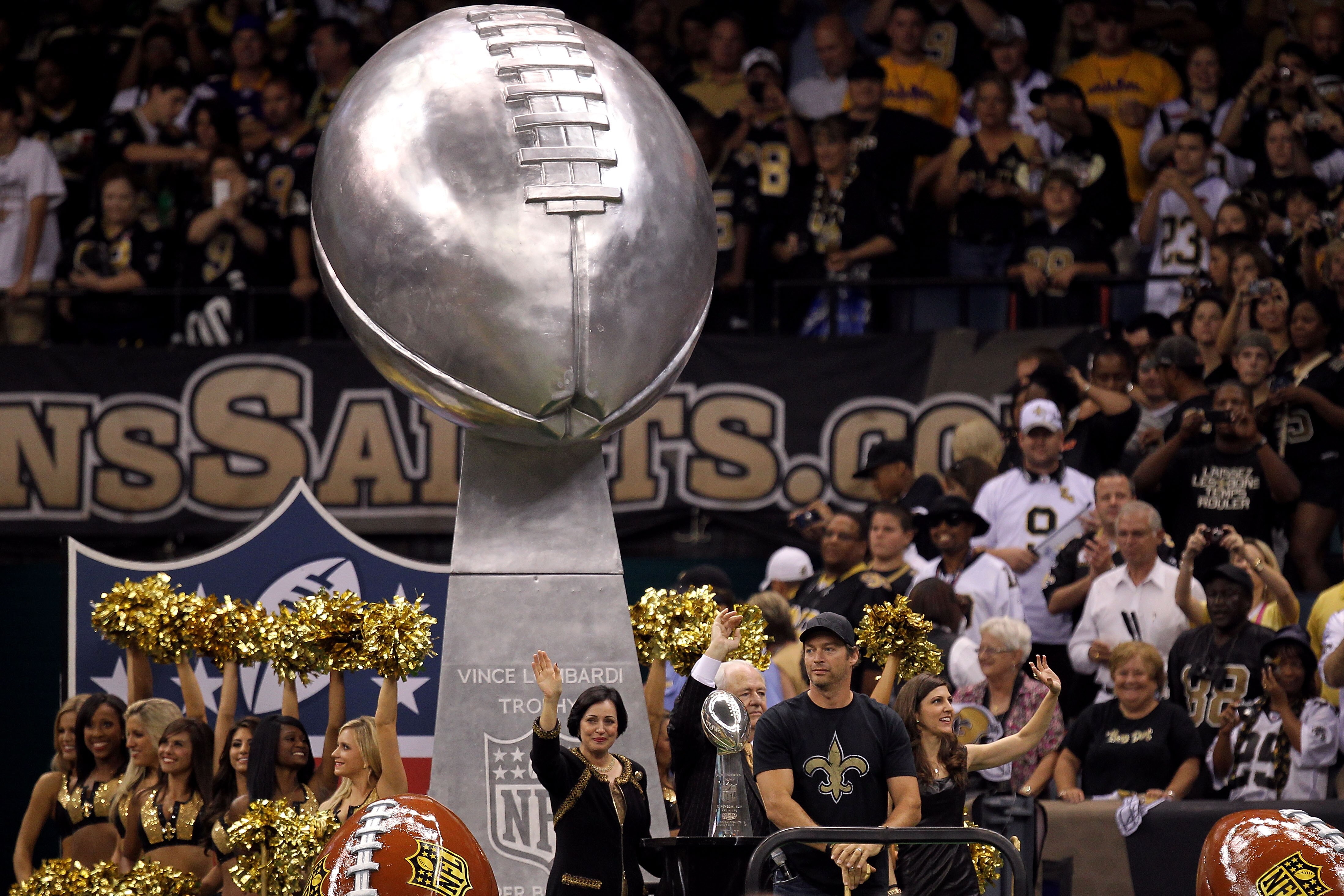 NEW ORLEANS - SEPTEMBER 09:  Harry Connick Jr. leads a float out onto the field which carried the Vince Lombardi Super Bowl Trophy which was won last year by the New Orleans Saints prior to the Saints playing against the Minnesota Vikings at Louisiana Sup