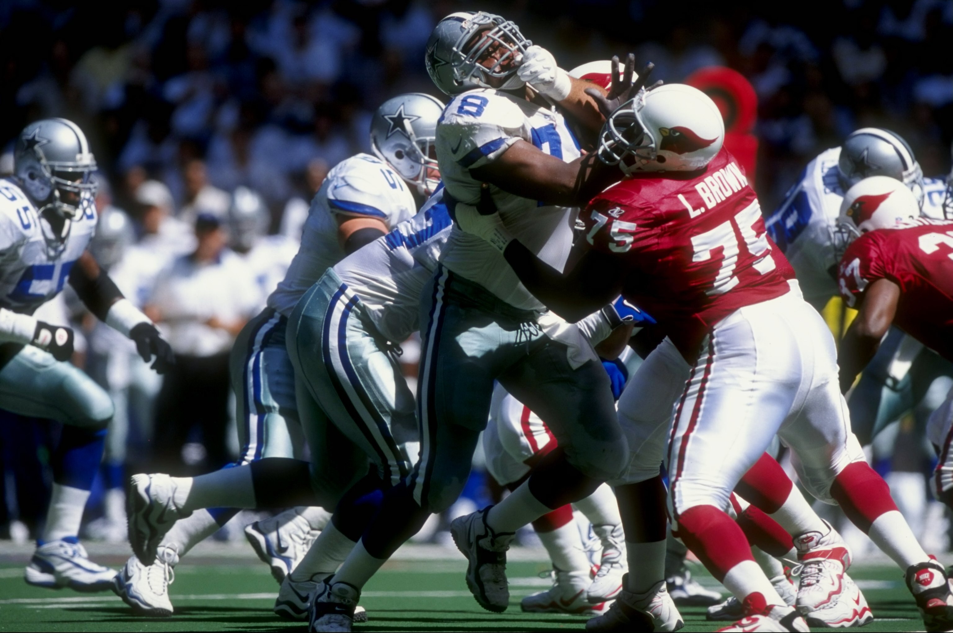 6 Sep 1998:  Leon Lett #78 of the Dallas Cowboys is blocked by Lomas Brown #75 of the Arizona Cardinals during a game at Texas Stadium in Irving, Texas. The Cowboys defeated the Cardinals 38-10. Mandatory Credit: Stephen Dunn  /Allsport