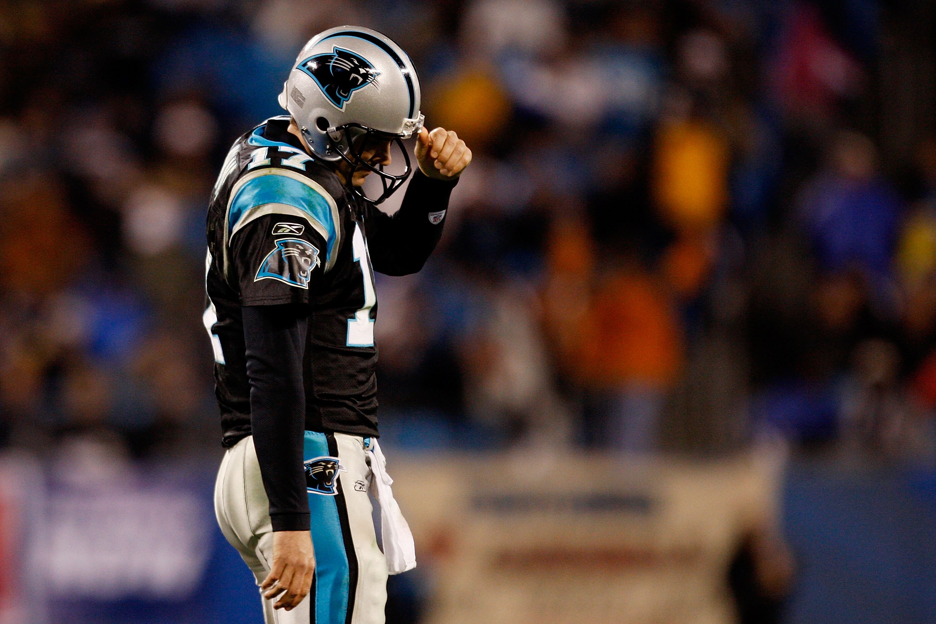 CHARLOTTE, NC - JANUARY 10:  Jake Delhomme #17 of the Carolina Panthers reacts at the end of the fourth quarter during the game against the Arizona Cardinals during the NFC Divisional Playoff Game on January 10, 2009 at Bank of America Stadium in Charlott