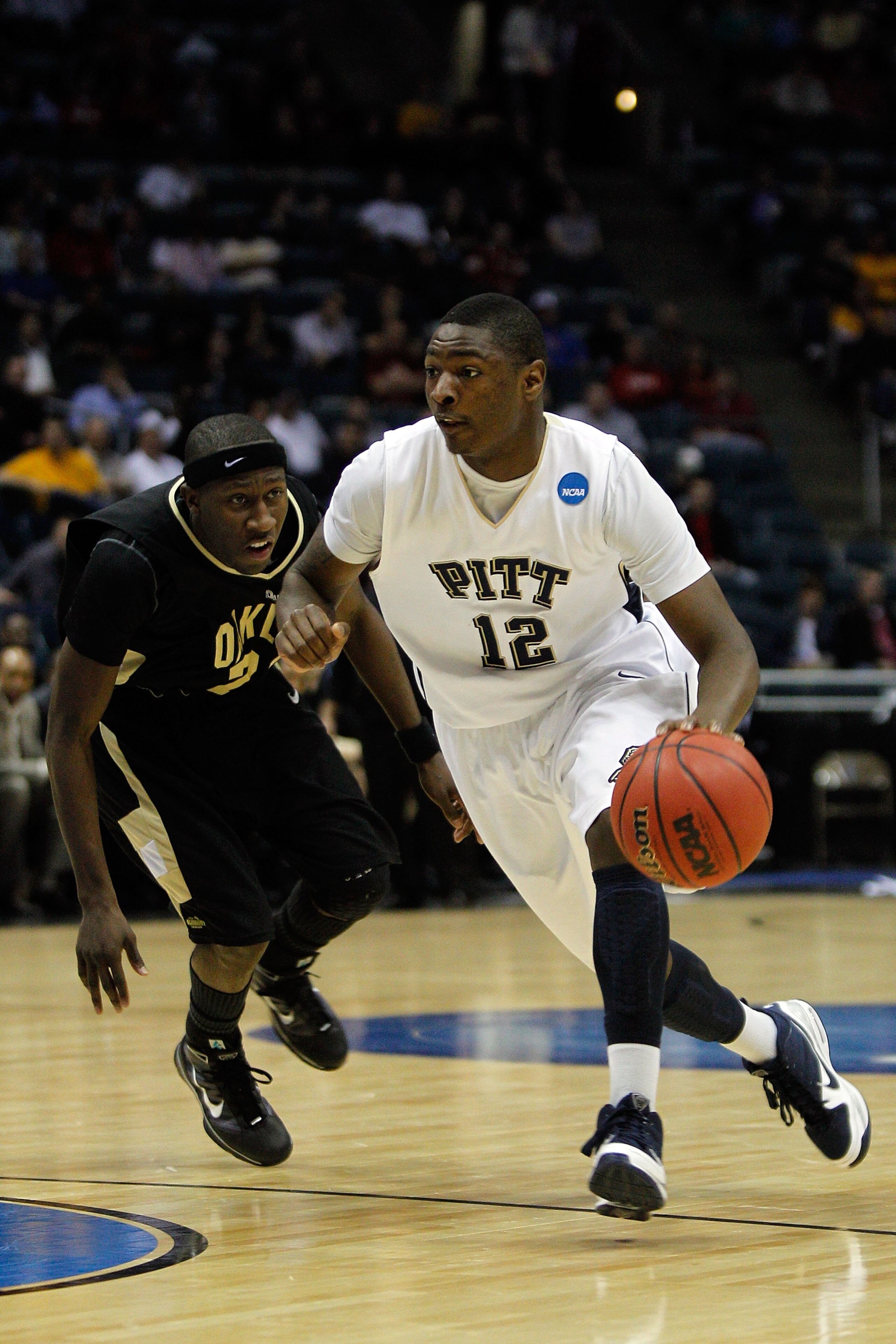 MILWAUKEE - MARCH 19:  Ashton Gibbs #12 of the Pittsburgh Panthers moves the ball while taking on the Oakland Golden Grizzlies during the first round of the 2010 NCAA men's basketball tournament at the Bradley Center on March 19, 2010 in Milwaukee, Wiscon