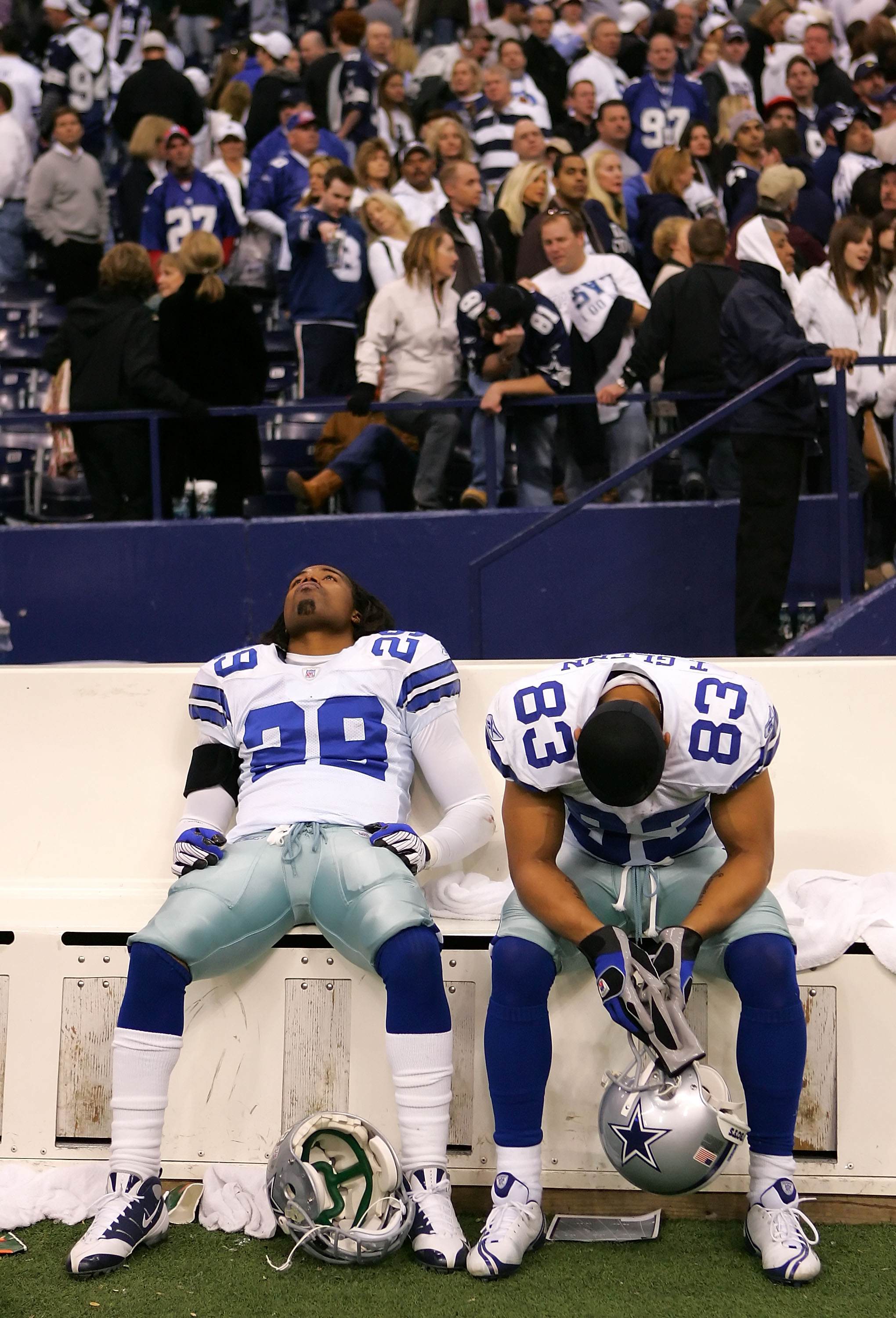 IRVING, TX - JANUARY 13:  Keith Davis #29 and Terry Glenn #83 of the Dallas Cowboys react during the final moments of the NFC Divisional Playoff game against the New York Giants at Texas Stadium on January 13, 2008 in Irving, Texas. The Giants defeated th