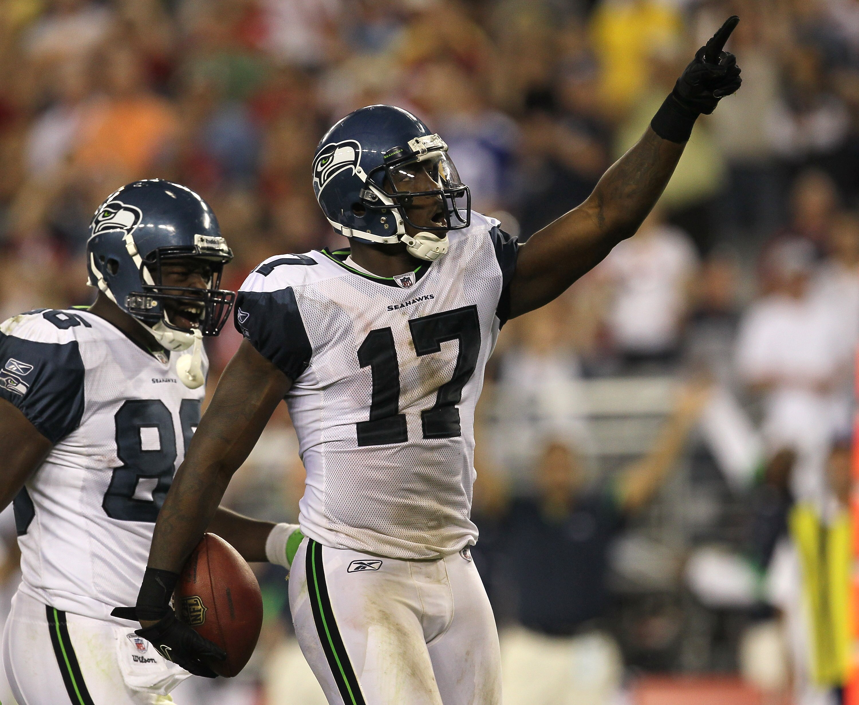 GLENDALE, AZ - NOVEMBER 14:  Wide receiver Mike Williams #17 of the Seattle Seahawks celerates after making a reception for a first down against the Arizona Cardinals at University of Phoenix Stadium on November 14, 2010 in Glendale, Arizona. Seattle won