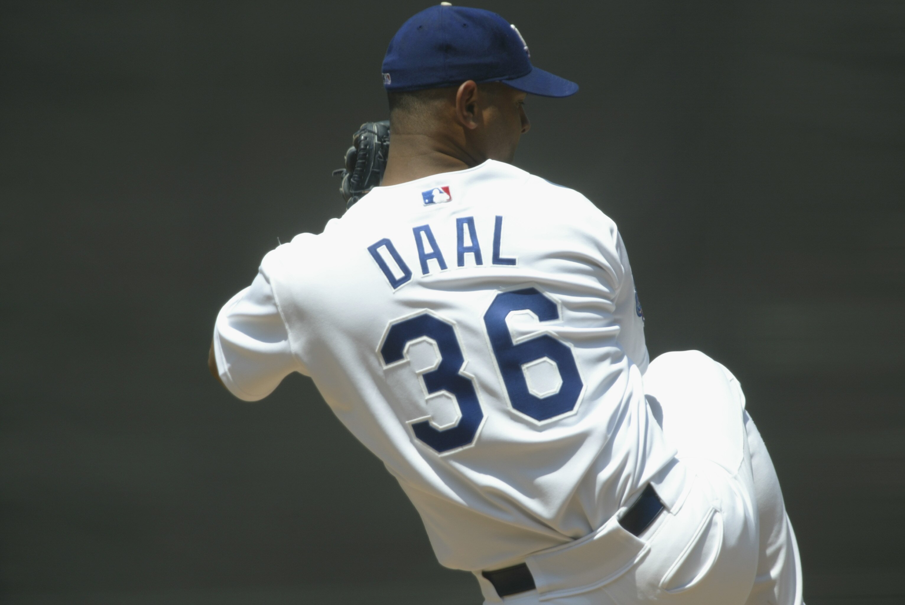 LOS ANGELES - JULY 20:  Starting Pitcher Omar Daal #36 of the Los Angeles Dodgers throws against the San Francisco Giants during the MLB game on July 20, 2002 at Dodger Stadium in Los Angeles, California.  The Dodgers defeated the Giants 4-2.  (Photo by S
