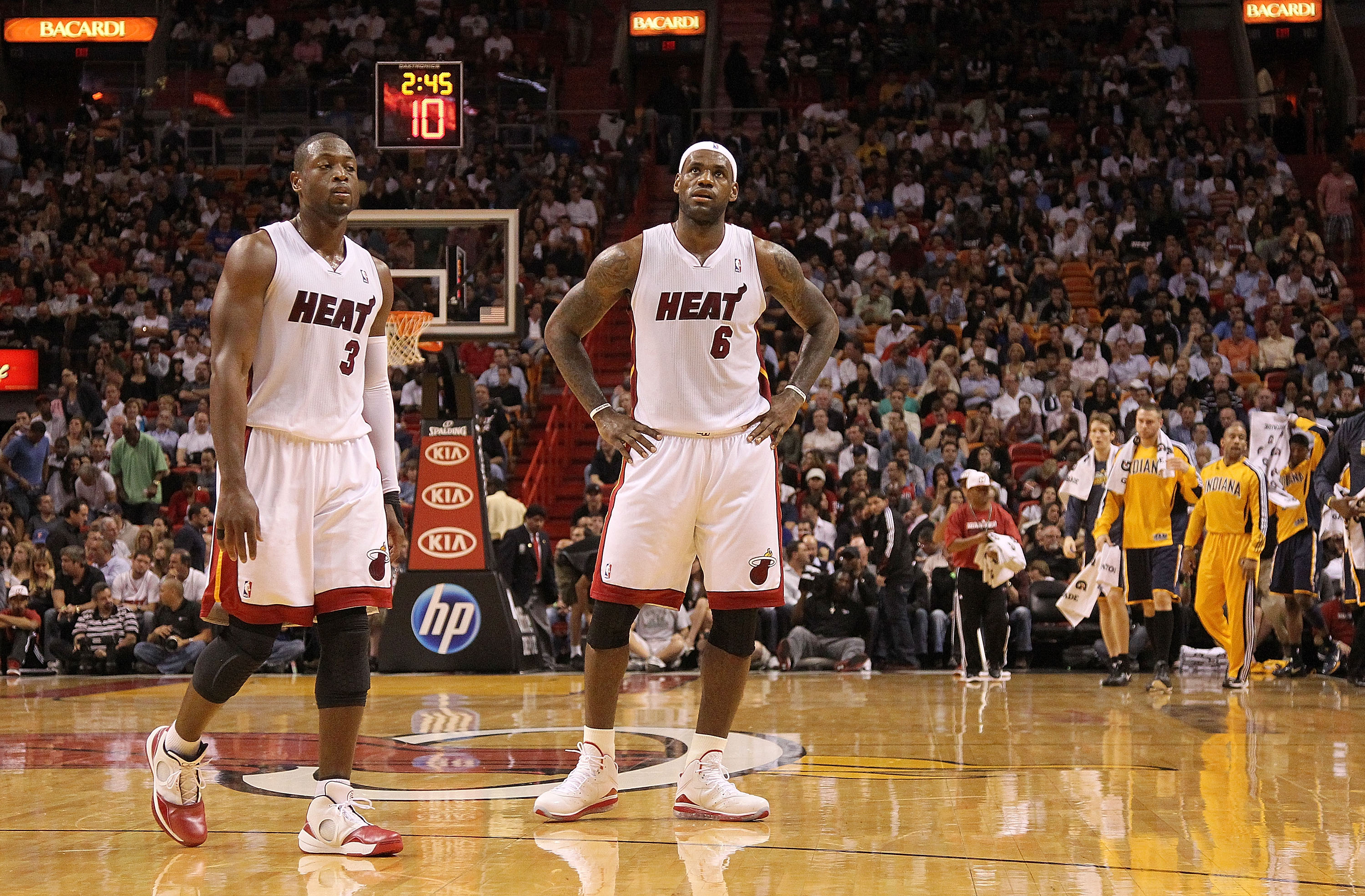 MIAMI - NOVEMBER 22: Dwyane Wade #3 and LeBron James #6 of the Miami Heat look on during a game against the Indiana Pacers at American Airlines Arena on November 22, 2010 in Miami, Florida. NOTE TO USER: User expressly acknowledges and agrees that, by dow