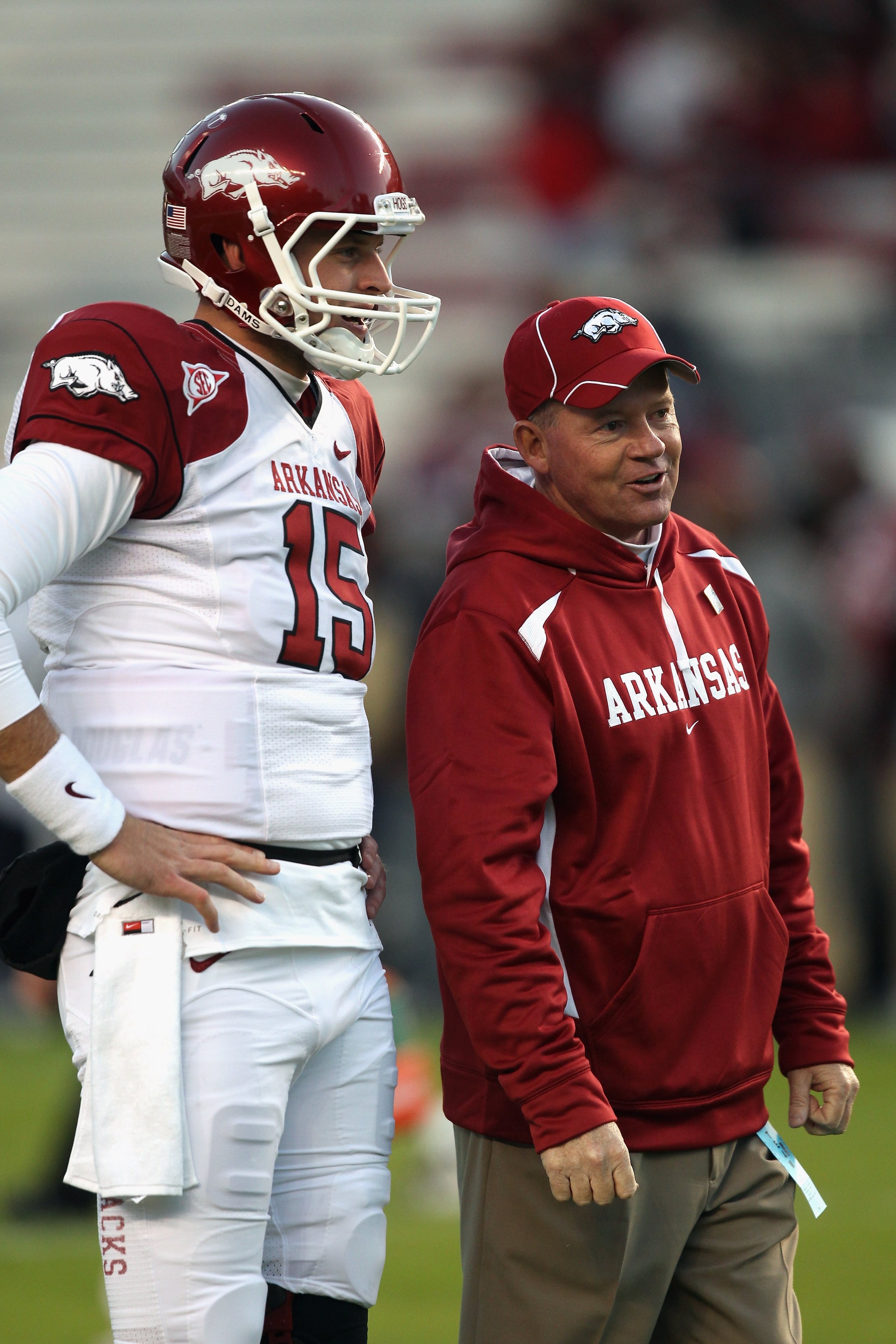 COLUMBIA, SC - NOVEMBER 06:  Head coach Bobby Petrino talks to starting quarterback Ryan Mallett #15 of the Arkansas Razorbacks during warm ups before the start of their game against the South Carolina Gamecocks at Williams-Brice Stadium on November 6, 20