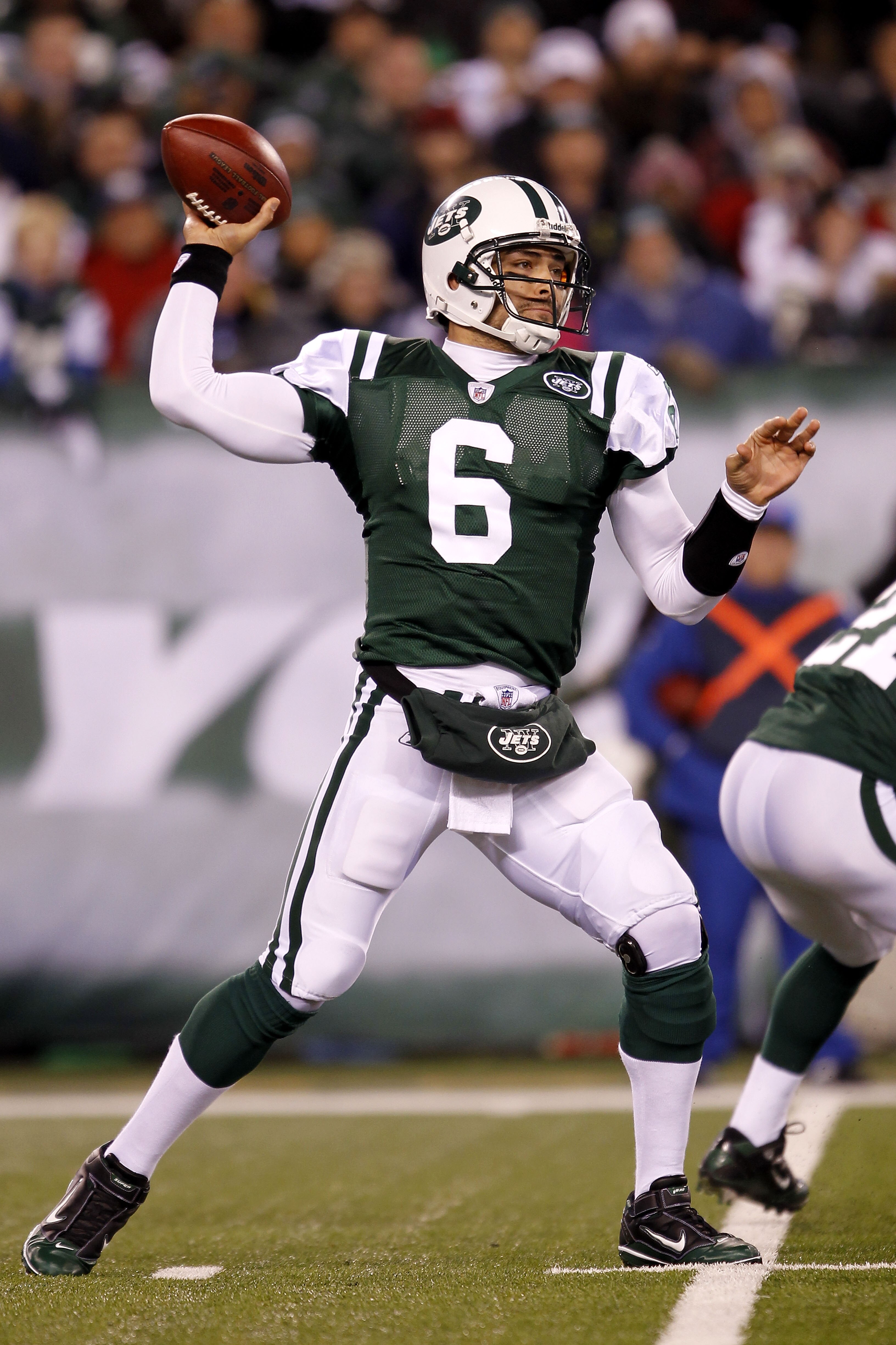 EAST RUTHERFORD, NJ - NOVEMBER 25:  Quarterback Mark Sanchez #6 of the New York Jets looks to throw a pass against the Cincinnati Bengals at New Meadowlands Stadium on November 25, 2010 in East Rutherford, New Jersey. The Jets defeated the Bengal 26-10.