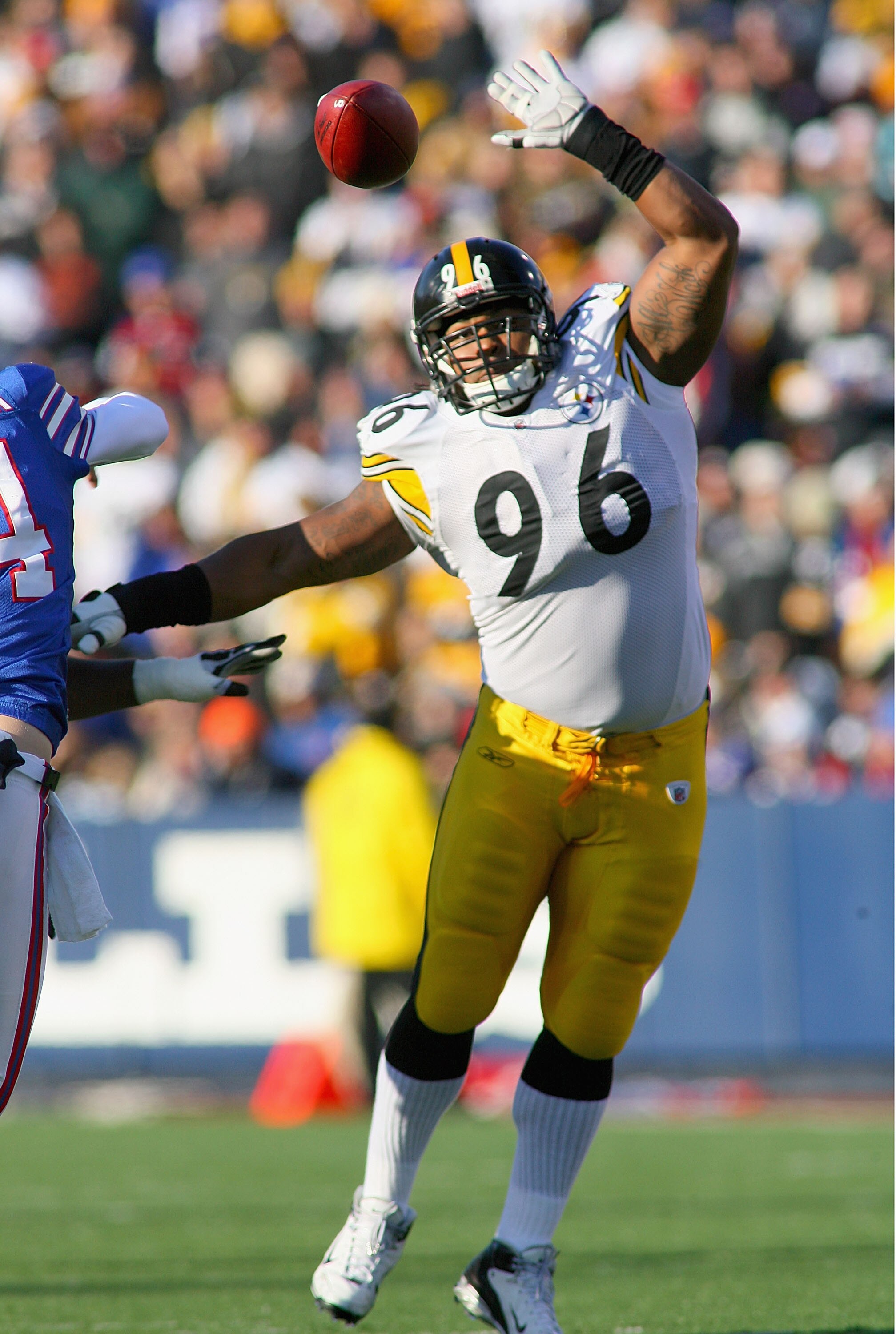 ORCHARD PARK, NY - NOVEMBER 28: Ziggy Hood #96 of the Pittsburgh Steelers pressures Ryan Fitzpatrick #14 of the Buffalo Bills on November 28, 2010 at Ralph Wilson Stadium in Orchard Park, New York.  (Photo by Rick Stewart/Getty Images)