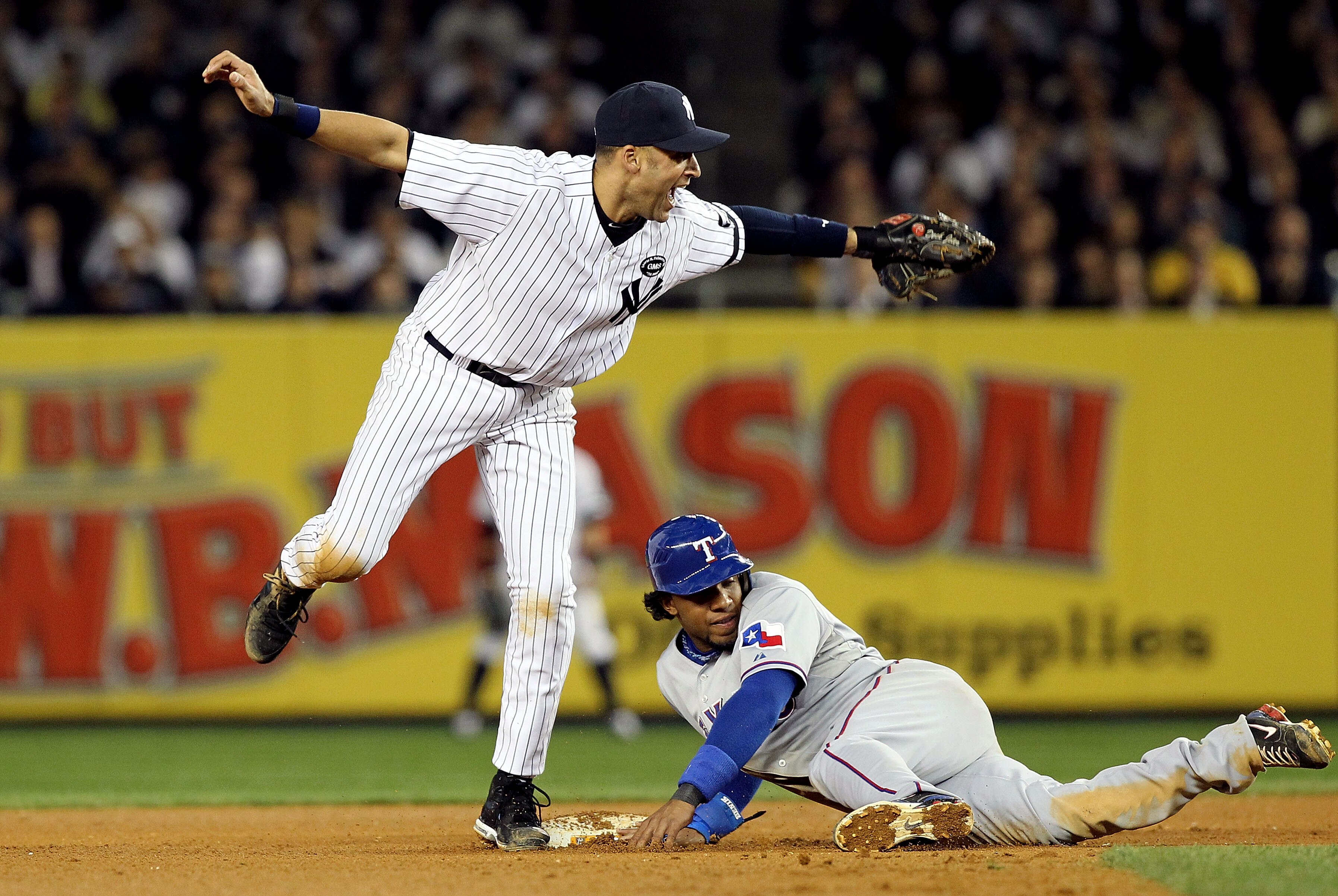 NEW YORK - OCTOBER 20:  Derek Jeter #2 of the New York Yankees reacts after tagging out Elvis Andrus #1 of the Texas Rangers on a pickoff play at second base in the top of the seventh inninng of Game Five of the ALCS during the 2010 MLB Playoffs at Yankee