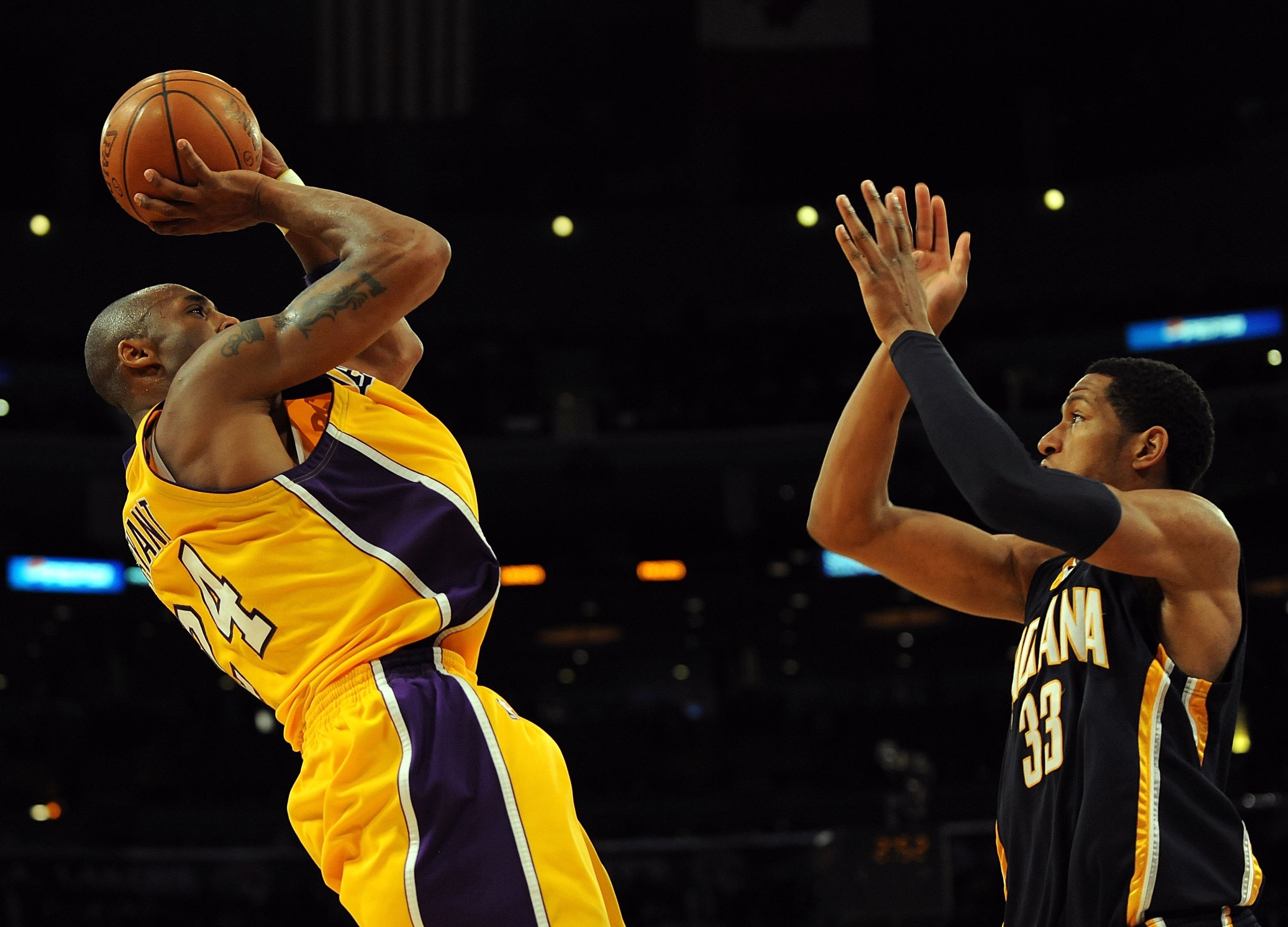LOS ANGELES, CA - JANUARY 09:  Kobe Bryant #24 of the Los Angeles Lakers shotos a fade away jumper in front of Danny Granger #33 of the Indiana Pacers at the Staples Center on January 9, 2009 in Los Angeles, California.   NOTE TO USER: User expressly ackn