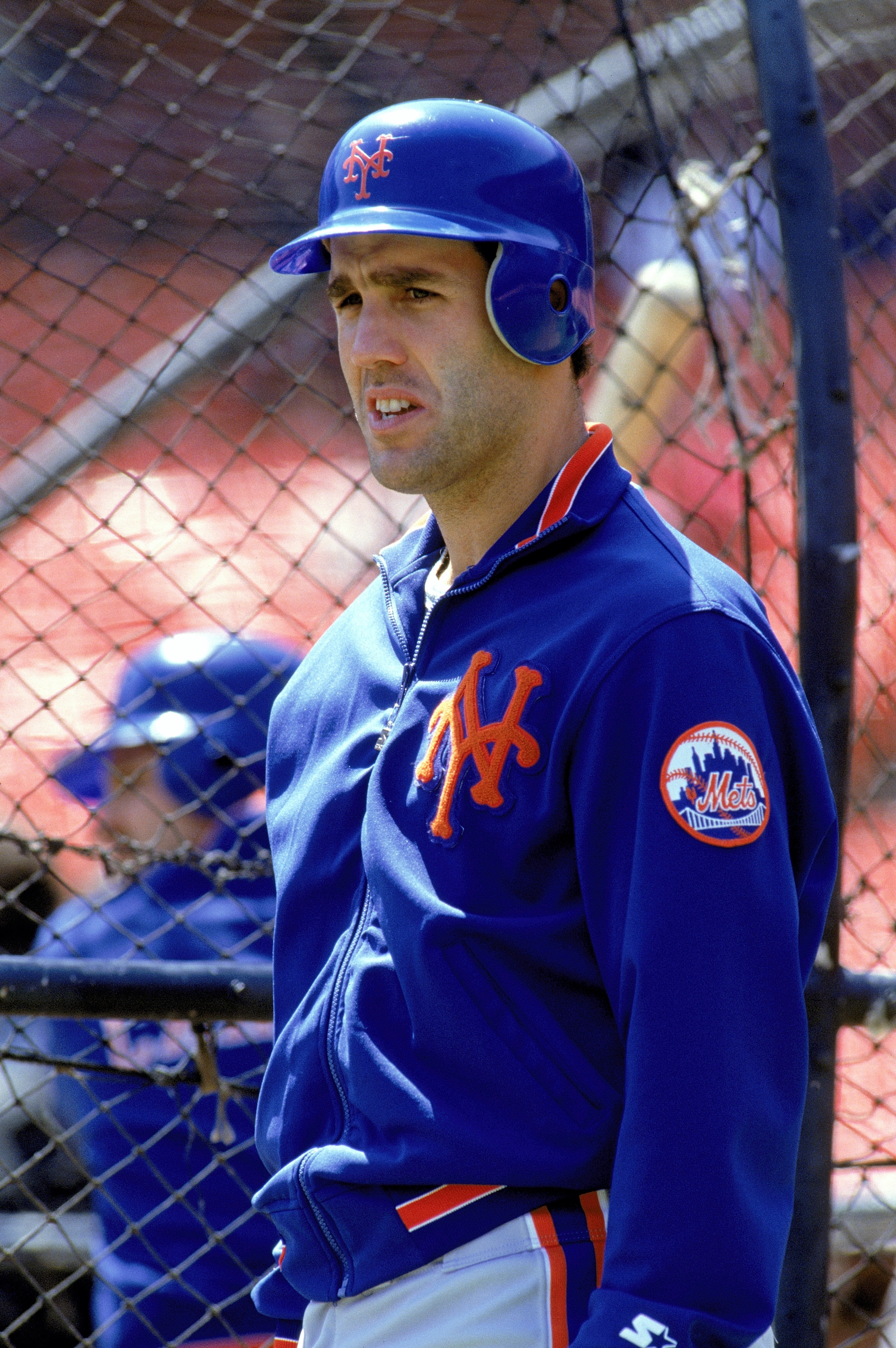 1990: Mike Marshall of the New York Mets looks on during batting practice before a game in the 1990 season. (Photo by: Otto Greule Jr/Getty Images) 1990: Mike Marshall of the New York Mets looks on during batting practice before a game in the 1990 season. (Photo by: Otto Greule Jr/Getty Images)