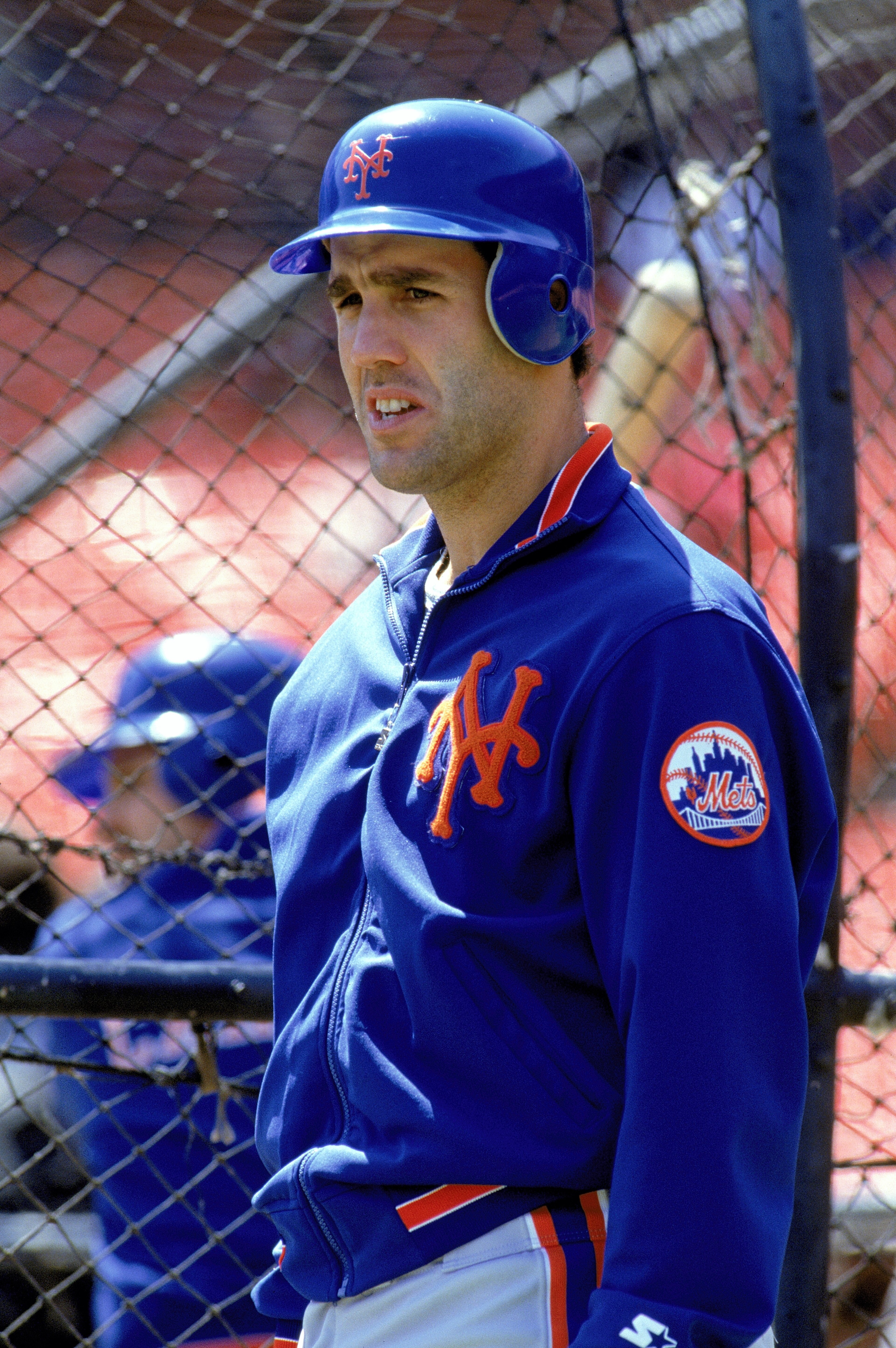 1990: Mike Marshall of the New York Mets looks on during batting practice before a game in the 1990 season. (Photo by: Otto Greule Jr/Getty Images) 1990: Mike Marshall of the New York Mets looks on during batting practice before a game in the 1990 season. (Photo by: Otto Greule Jr/Getty Images)