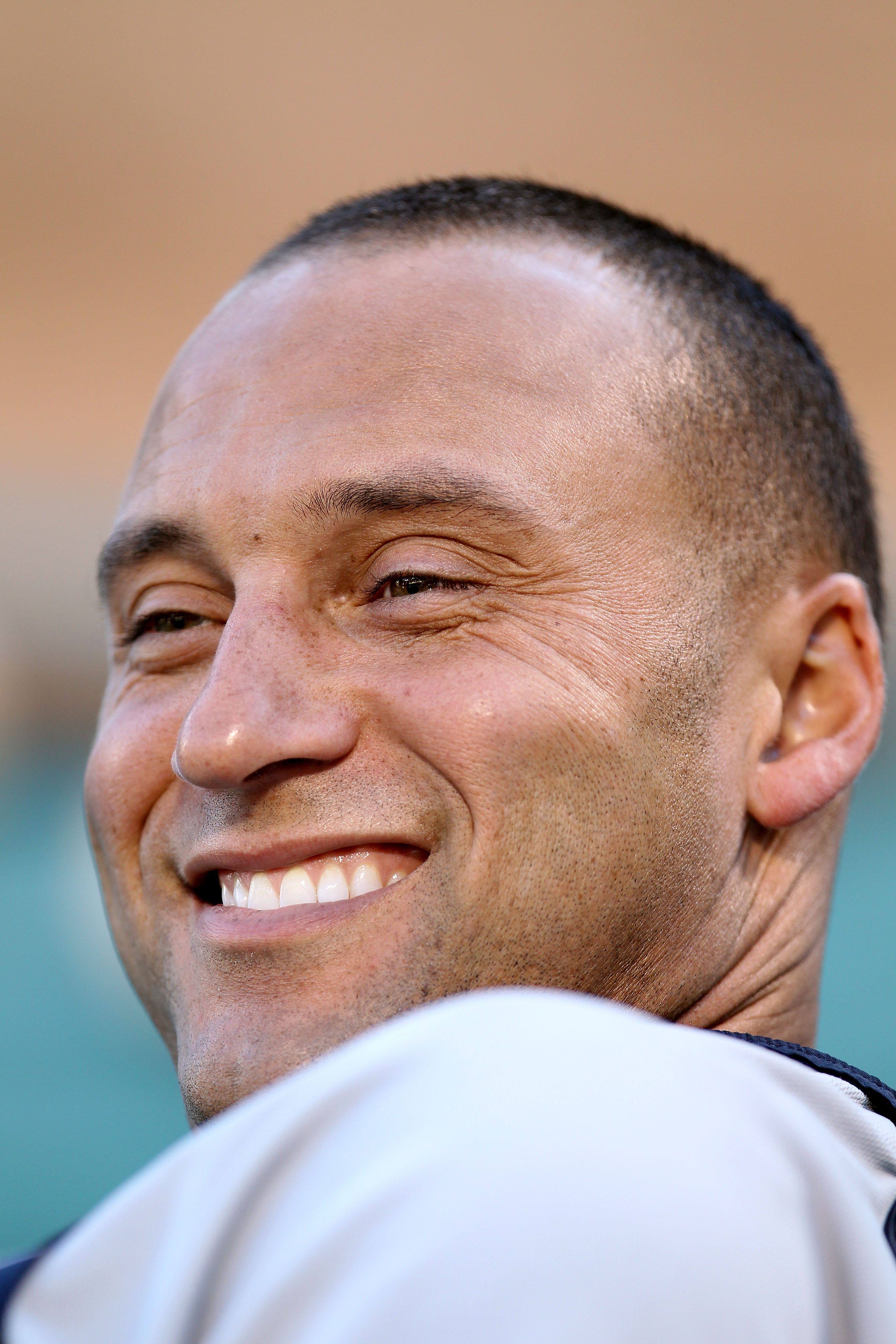 ARLINGTON, TX - OCTOBER 15:  Derek Jeter #2 of the New York Yankees looks on during batting ptractice against the Texas Rangers in Game One of the ALCS during the 2010 MLB Playoffs at Rangers Ballpark in Arlington on October 15, 2010 in Arlington, Texas.