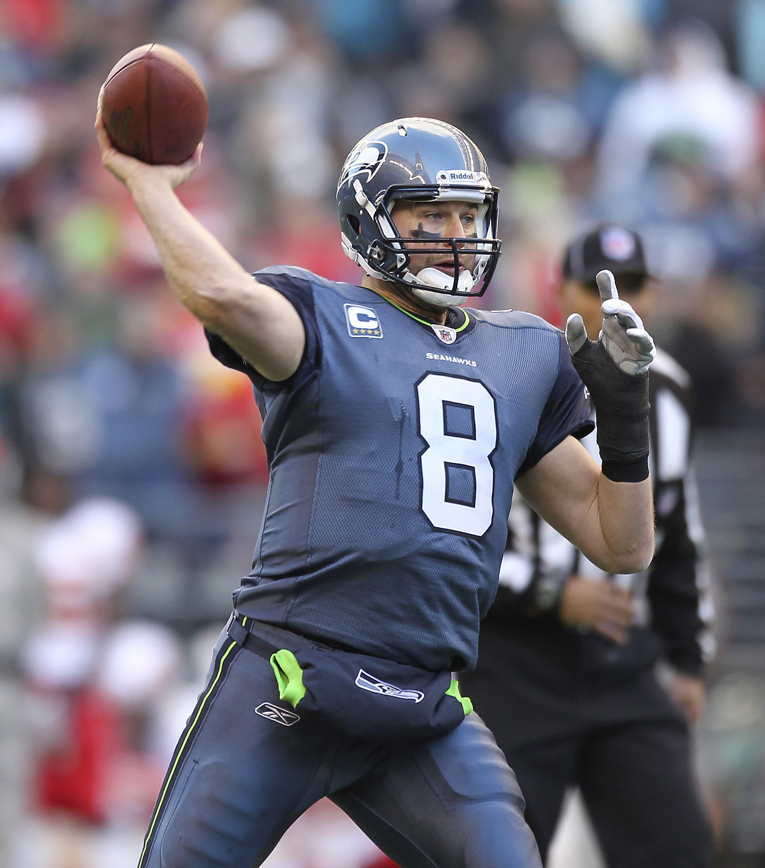SEATTLE - NOVEMBER 28:  Quarterback Matt Hasselbeck #8 of the Seattle Seahawks throws a touchdown pass to Chris Baker in the third quarter against the Kansas City Chiefs at Qwest Field on November 28, 2010 in Seattle, Washington. The Chiefs defeated the S