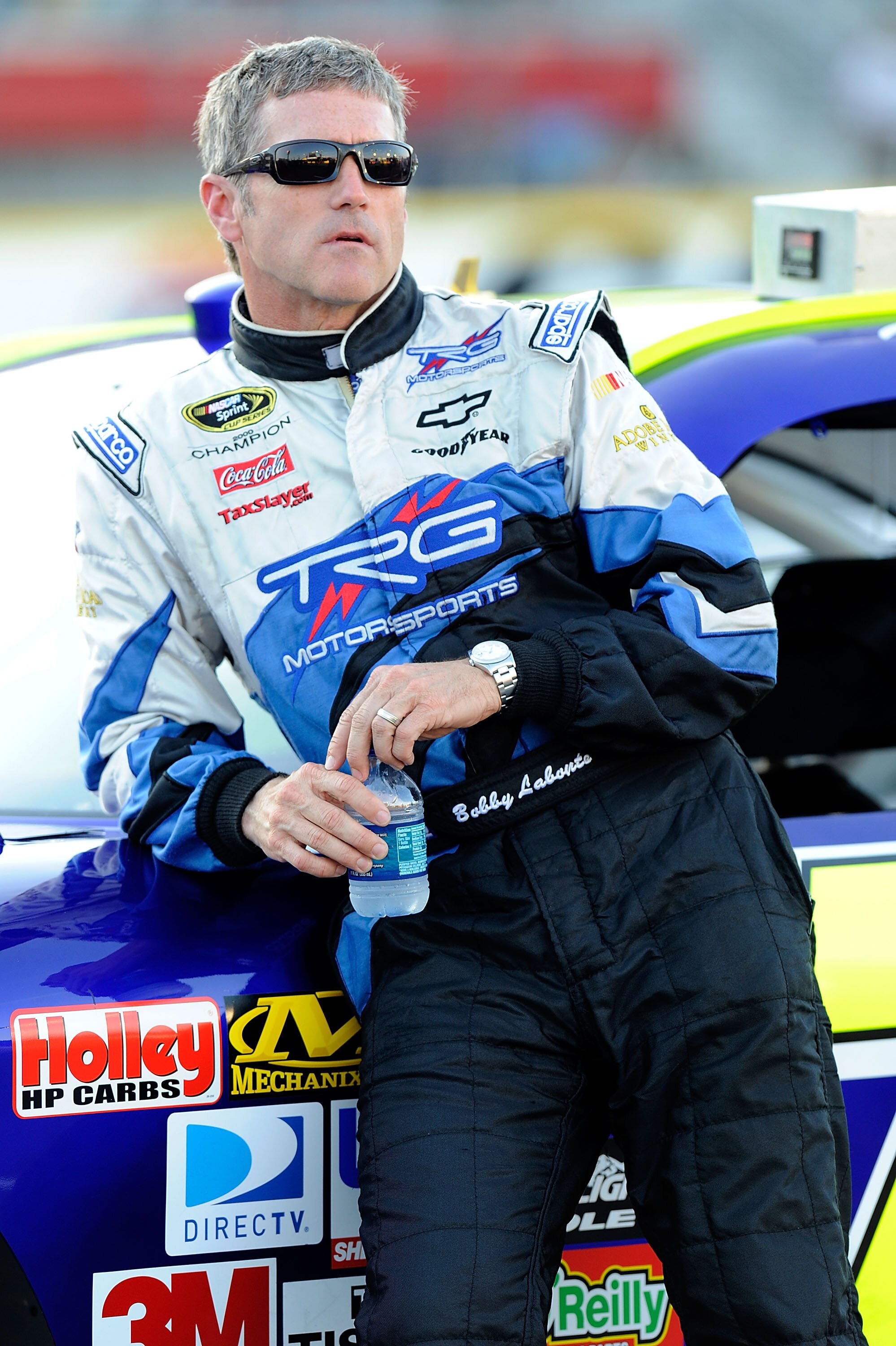 CONCORD, NC - MAY 27:  Bobby Labonte leans on the #71 TRG Motorsports Chevrolet, during qualifying for the NASCAR Sprint Cup Series Coca-Cola 600 at Charlotte Motor Speedway on May 27, 2010 in Concord, North Carolina.  (Photo by John Harrelson/Getty Image