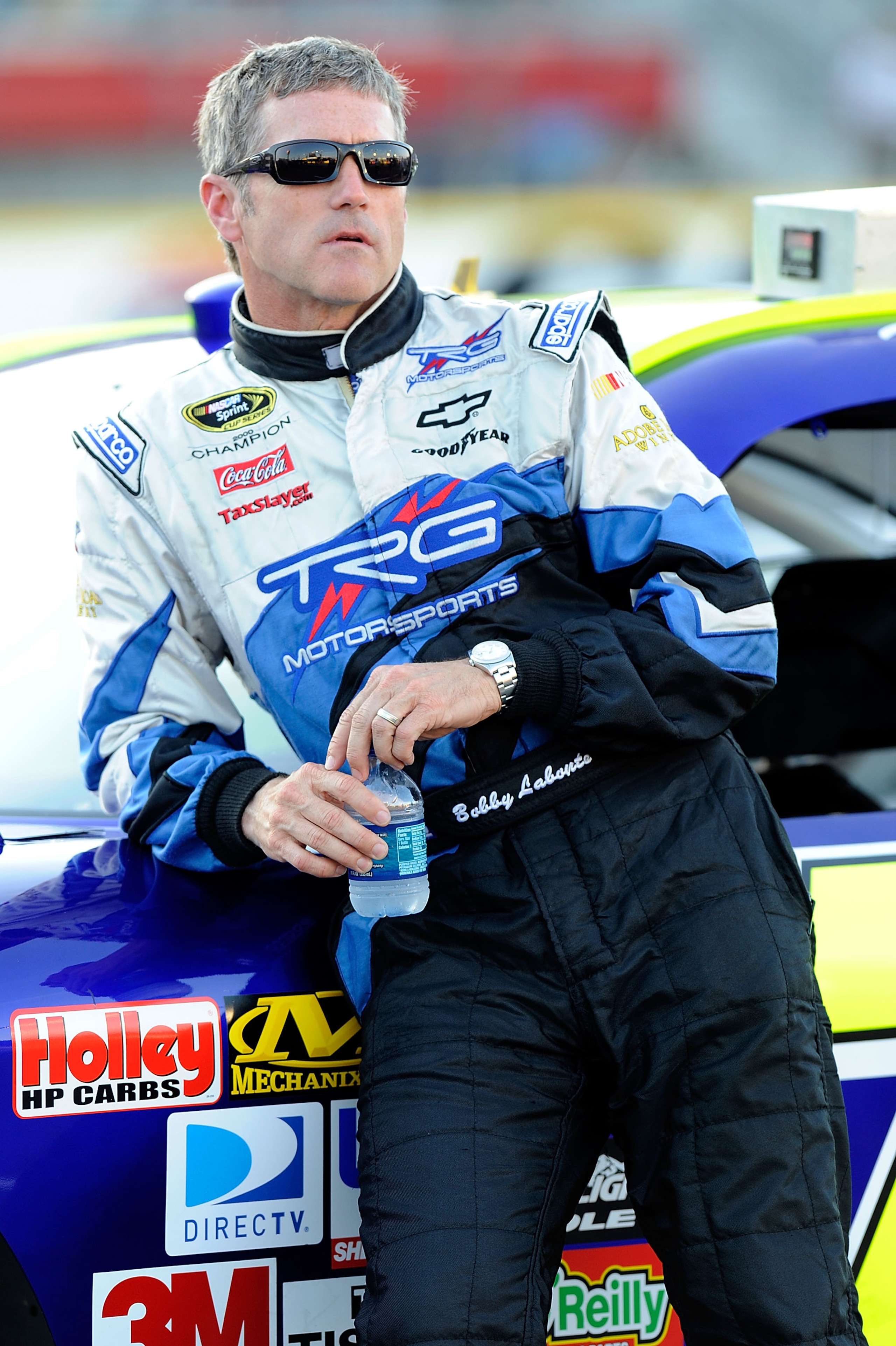 CONCORD, NC - MAY 27:  Bobby Labonte leans on the #71 TRG Motorsports Chevrolet, during qualifying for the NASCAR Sprint Cup Series Coca-Cola 600 at Charlotte Motor Speedway on May 27, 2010 in Concord, North Carolina.  (Photo by John Harrelson/Getty Image
