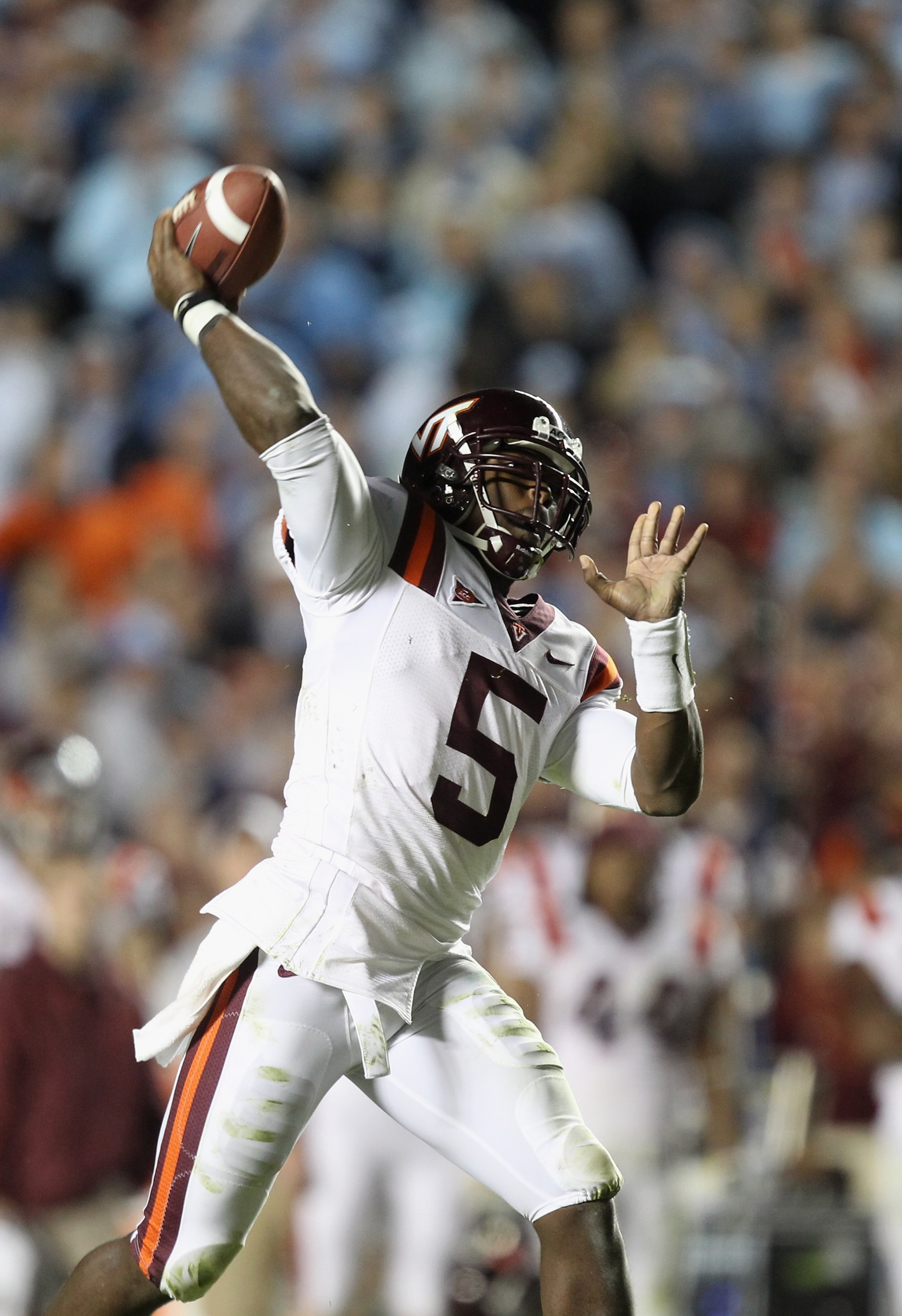 CHAPEL HILL, NC - NOVEMBER 13:  Tyrod Taylor #5 of the Virginia Tech Hokies drops back to throw a pass against the North Carolina Tar Heels during their game at Kenan Stadium on November 13, 2010 in Chapel Hill, North Carolina.  (Photo by Streeter Lecka/G