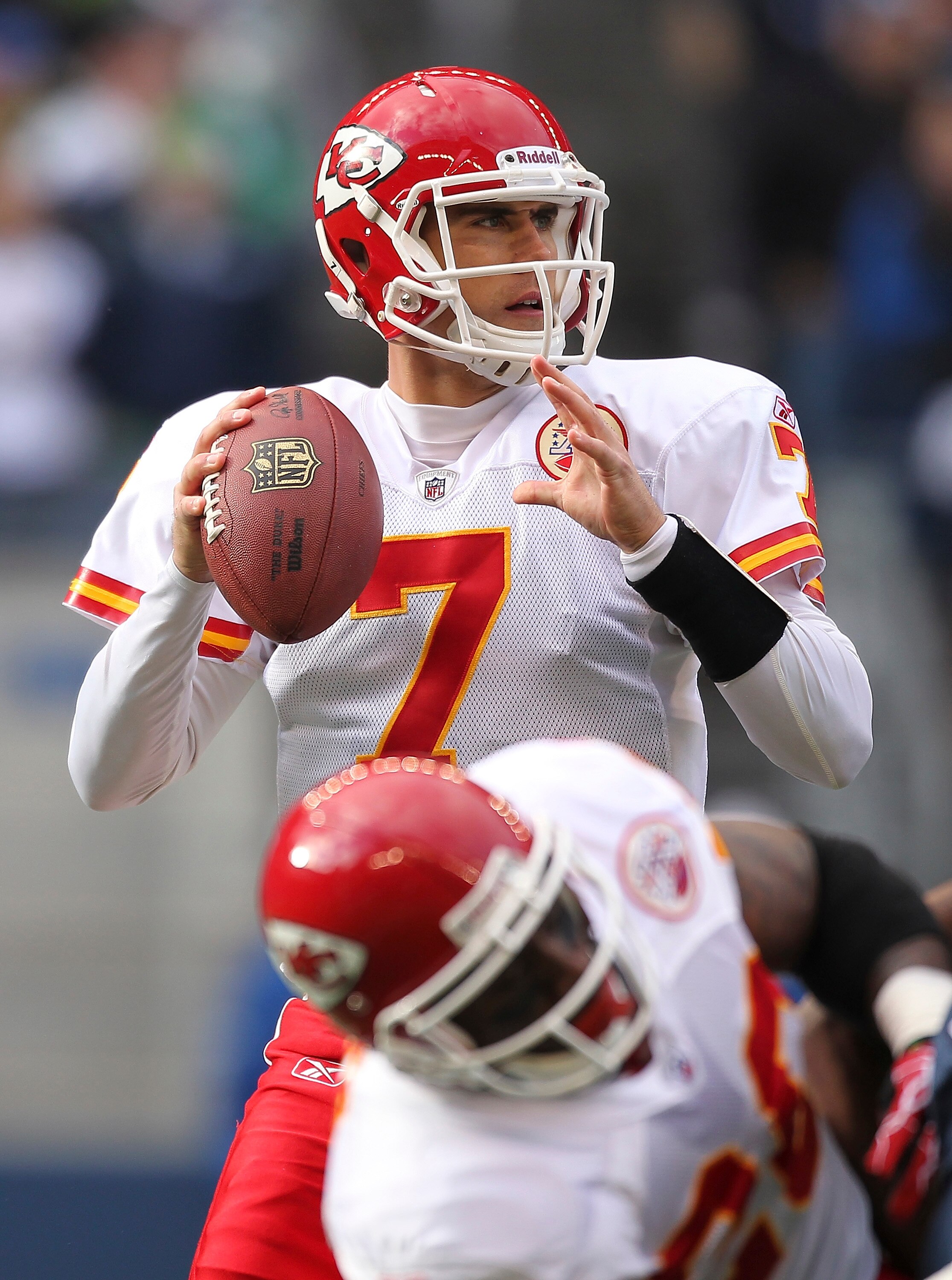 SEATTLE - NOVEMBER 28:  Quarterback Matt Cassel #7 of the Kansas City Chiefs looks downfield as Thomas Jones #20 blocks against the Seattle Seahawks at Qwest Field on November 28, 2010 in Seattle, Washington. The Chiefs defeated the Seahawks 42-24. (Photo