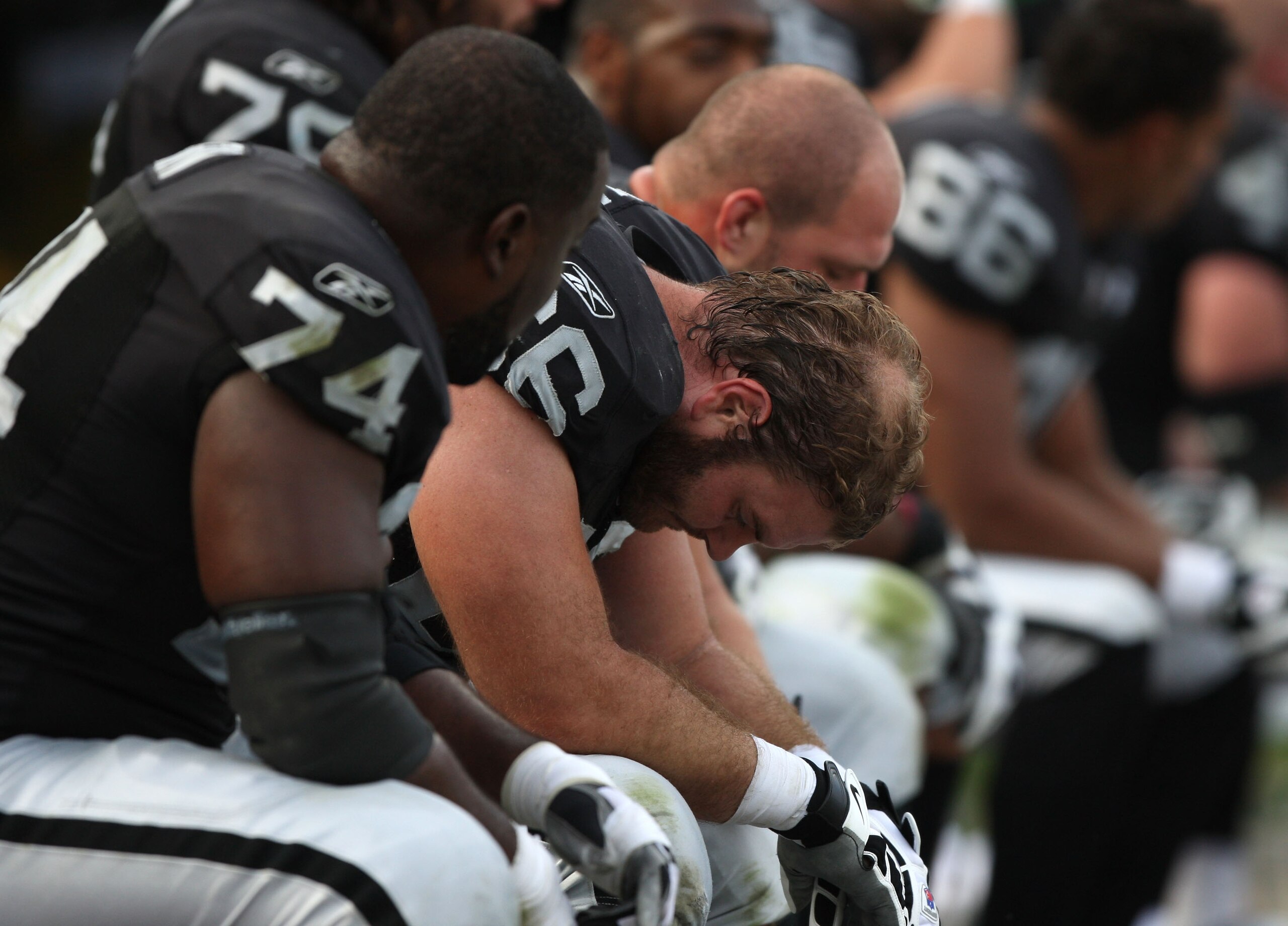 OAKLAND, CA - NOVEMBER 09:  Cooper Carlisle #66 of the Oakland Raiders sits on the bench against the Carolina Panthers during an NFL game on November 9, 2008 at the Oakland-Alameda County Coliseum in Oakland, California.  (Photo by Jed Jacobsohn/Getty Ima