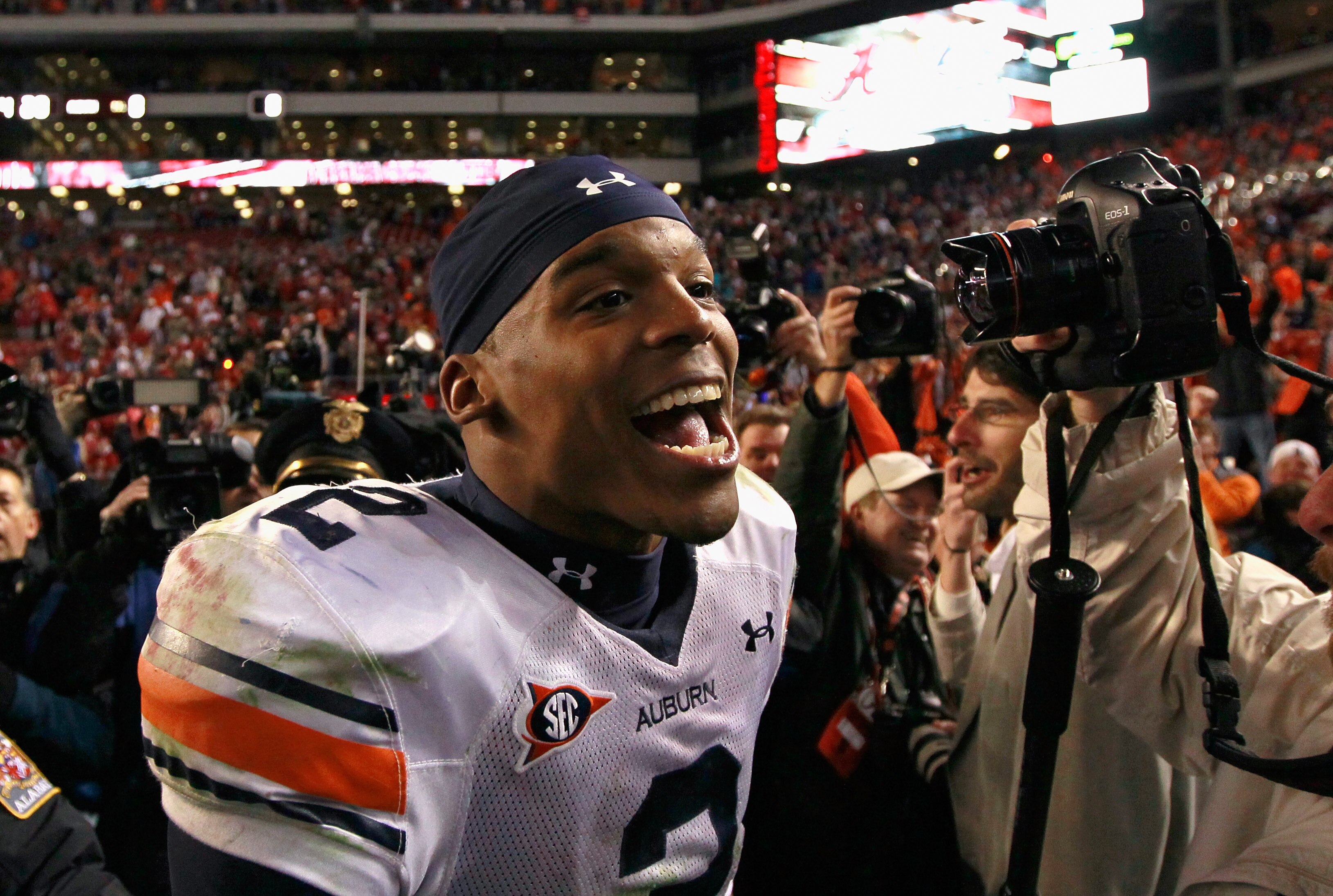 TUSCALOOSA, AL - NOVEMBER 26:  Quarterback Cam Newton #2 of the Auburn Tigers celebrates their 28-27 win over the Alabama Crimson Tide at Bryant-Denny Stadium on November 26, 2010 in Tuscaloosa, Alabama.  (Photo by Kevin C. Cox/Getty Images)