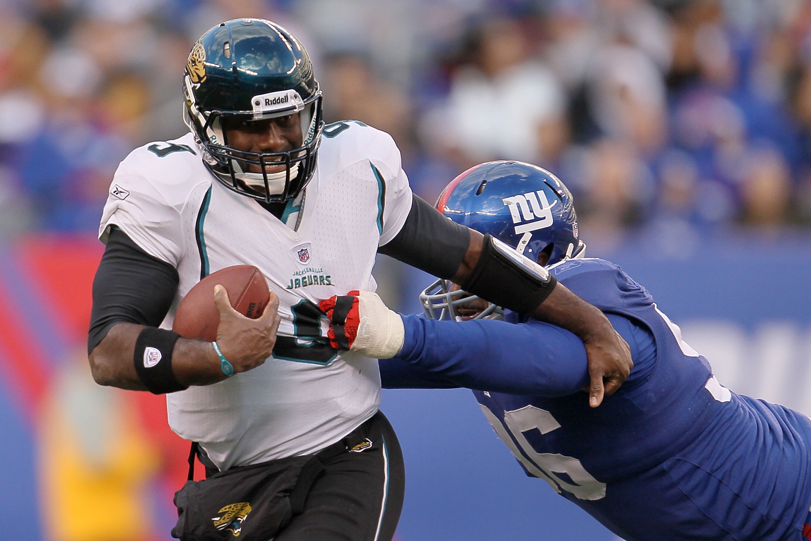 EAST RUTHERFORD, NJ - NOVEMBER 28:  David Garrard #9 of the Jacksonville Jaguars is sacked by Barry Cofield #96 of the New York Giants at New Meadowlands Stadium on November 28, 2010 in East Rutherford, New Jersey.  (Photo by Chris McGrath/Getty Images)