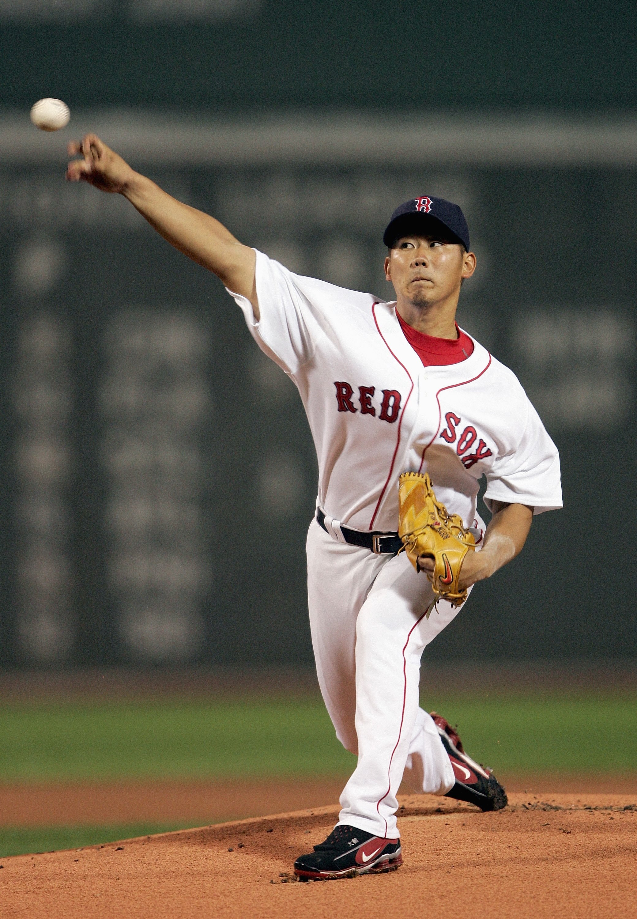 BOSTON - JULY 19: Daisuke Matsuzaka #18 of the Boston Red Sox delivers a pitch in the first inning against the Chicago White Sox on July 19, 2007 at Fenway Park in Boston, Massachusetts. (Photo by Elsa/Getty Images)