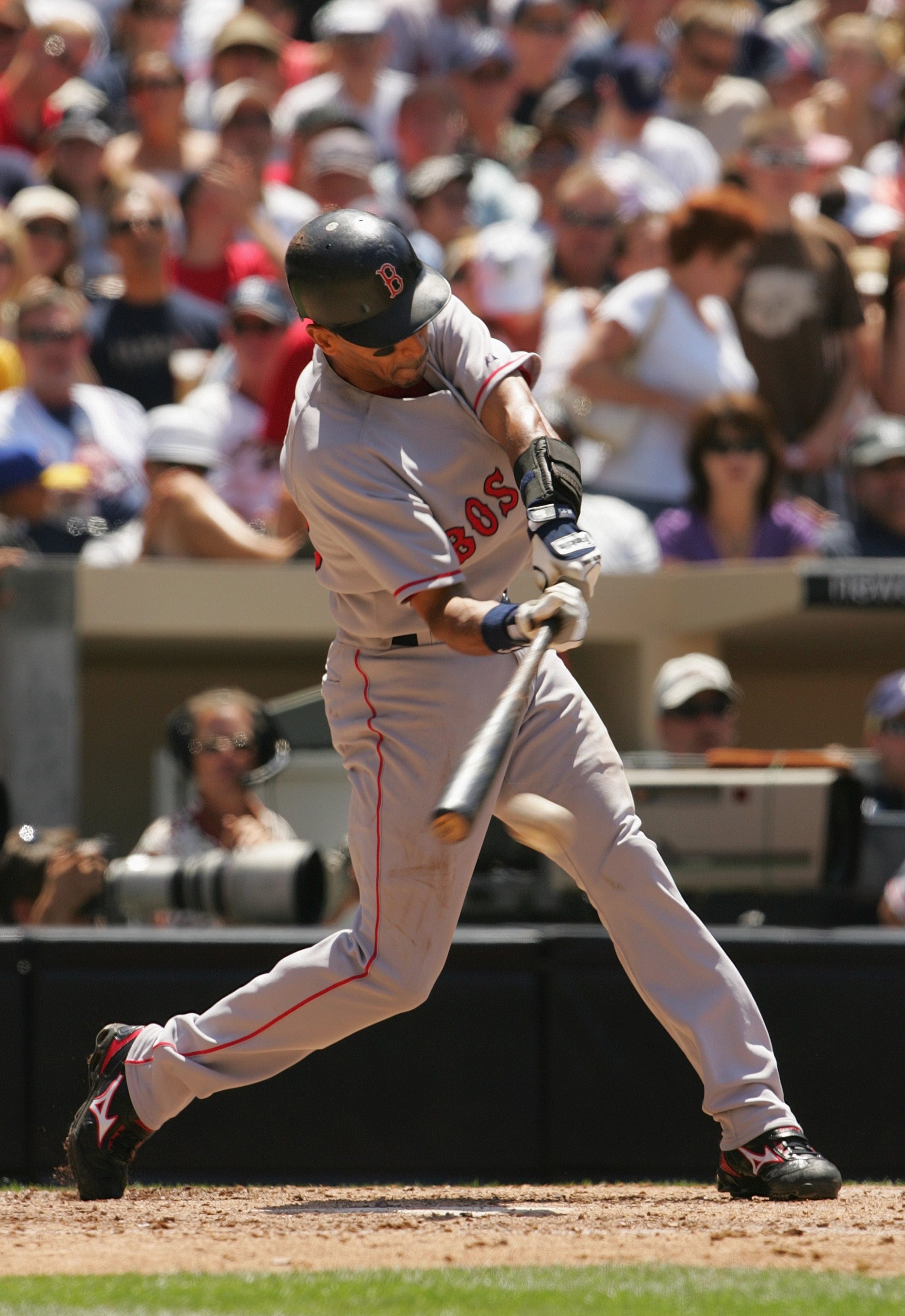 SAN DIEGO - JUNE 24:  Julio Lugo #23 of the Boston Red Sox bats against the San Diego Padres on June 24, 2007 at Petco Park in San Diego, California. The Red Sox won 4-2. (Photo by Stephen Dunn/Getty Images)