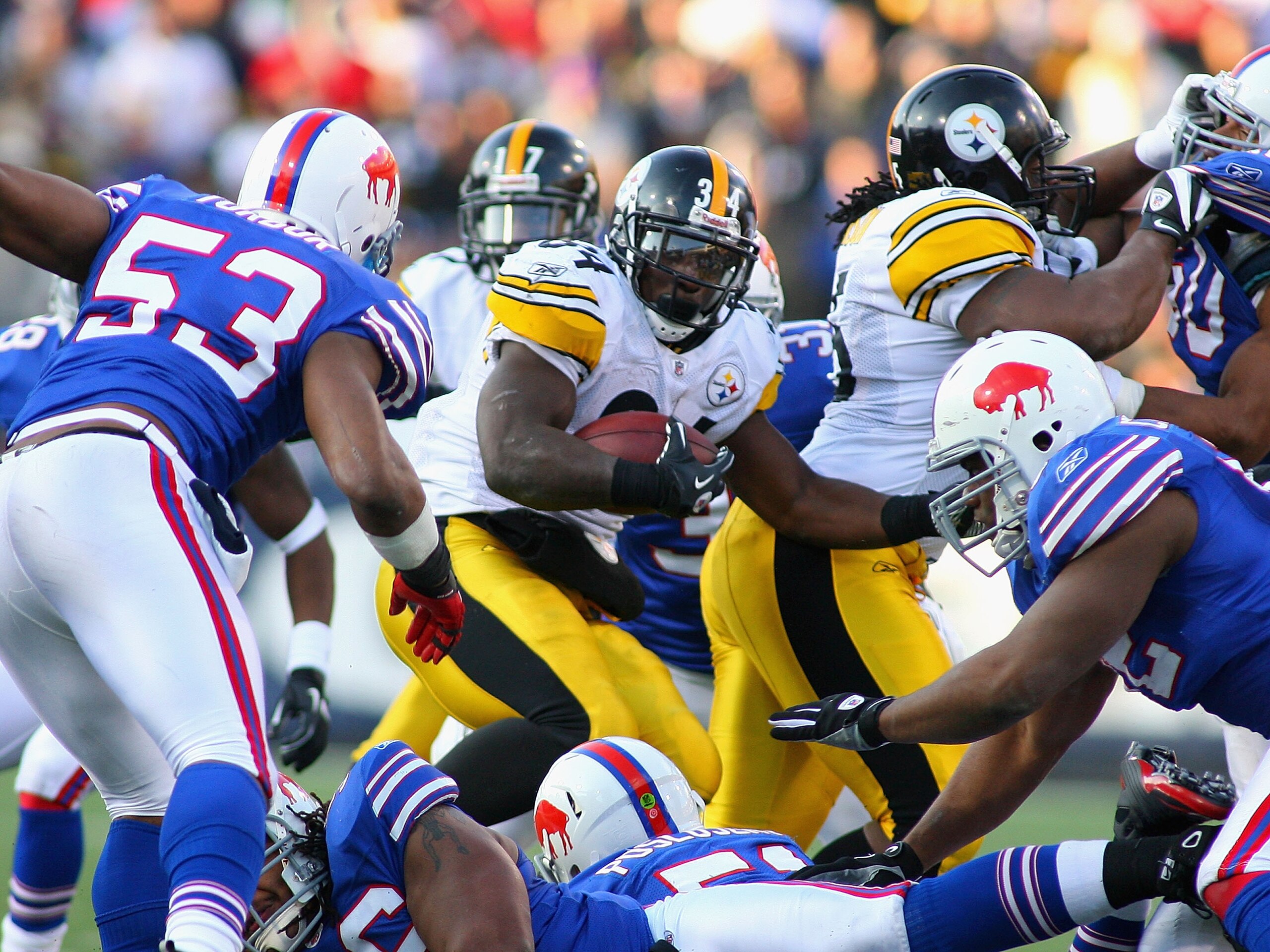 ORCHARD PARK, NY - NOVEMBER 28:  Rashard Mendenhall #34  of the Pittsburgh Steelers runs against the Buffalo Bills at Ralph Wilson Stadium at Ralph Wilson Stadium on November 28, 2010 in Orchard Park, New York. Pittsburgh won 19-16 in overtime. (Photo by